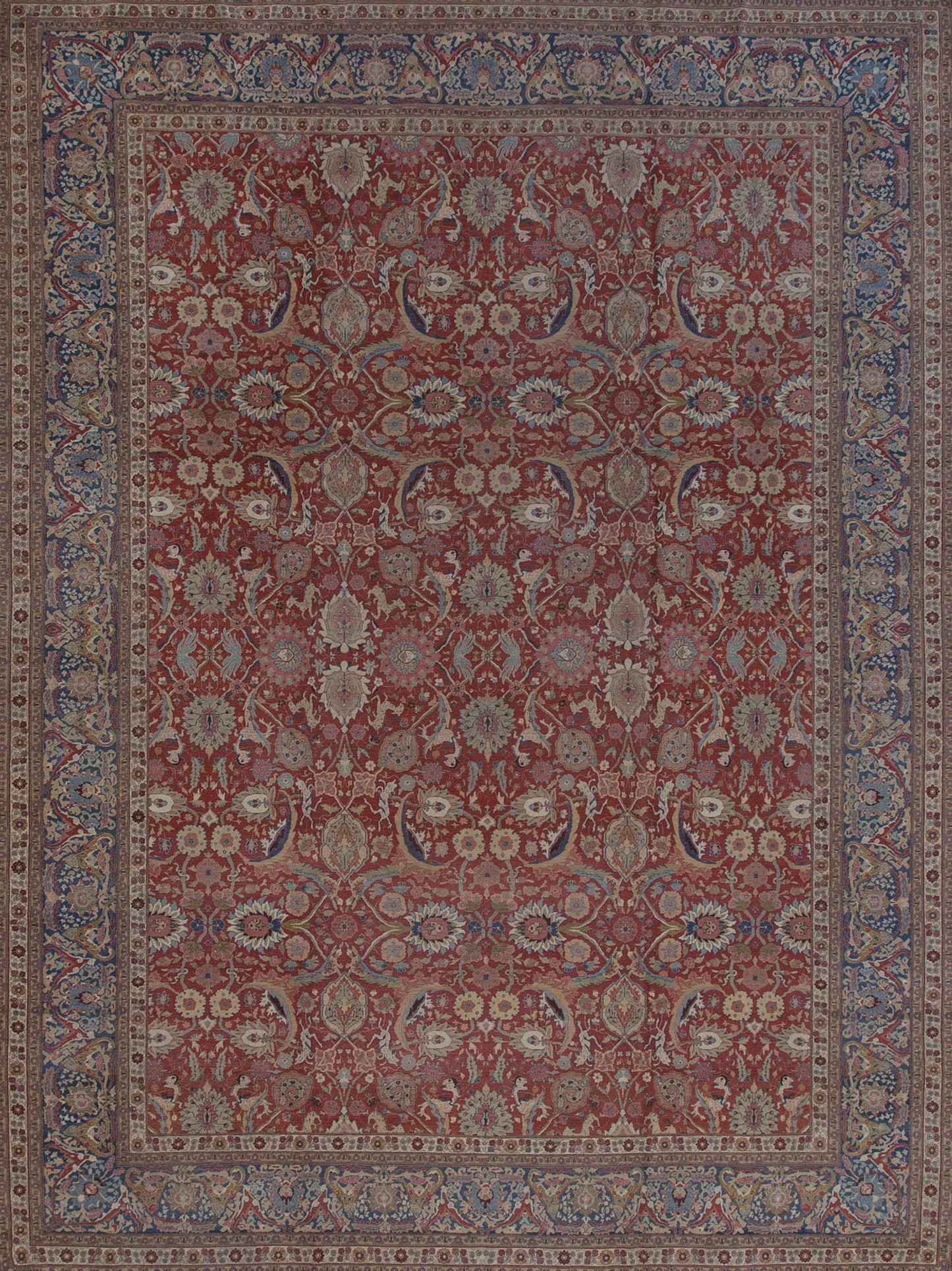 Red rug with a frame in light blue. This rug comes with a flower pattern.