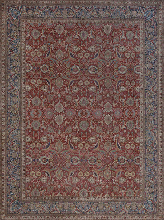 Red rug with a frame in light blue. This rug comes with a flower pattern.