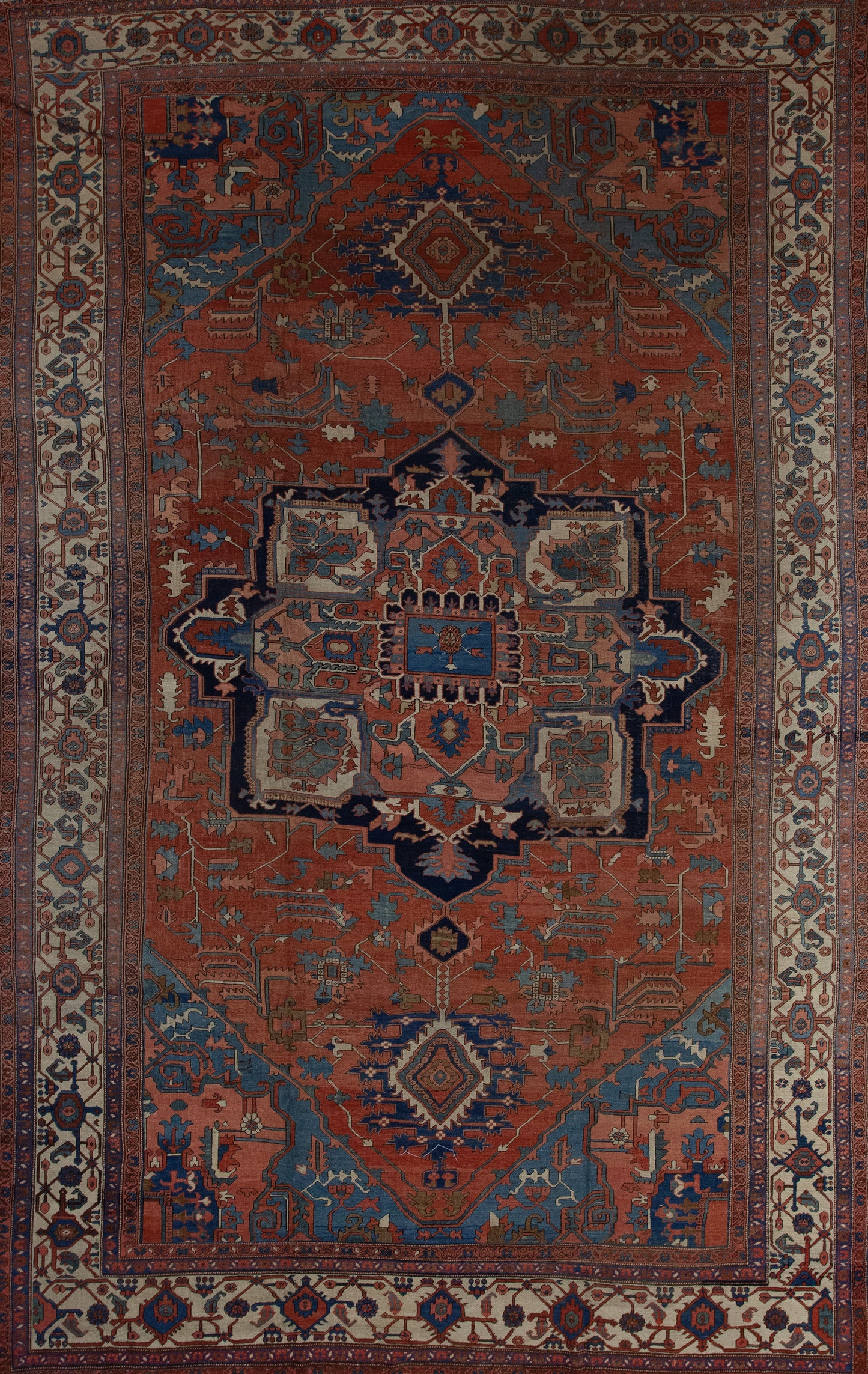 Antique carpet has a brown background which is the dominant color, and the center features an interesting artwork which creates an eight points star.