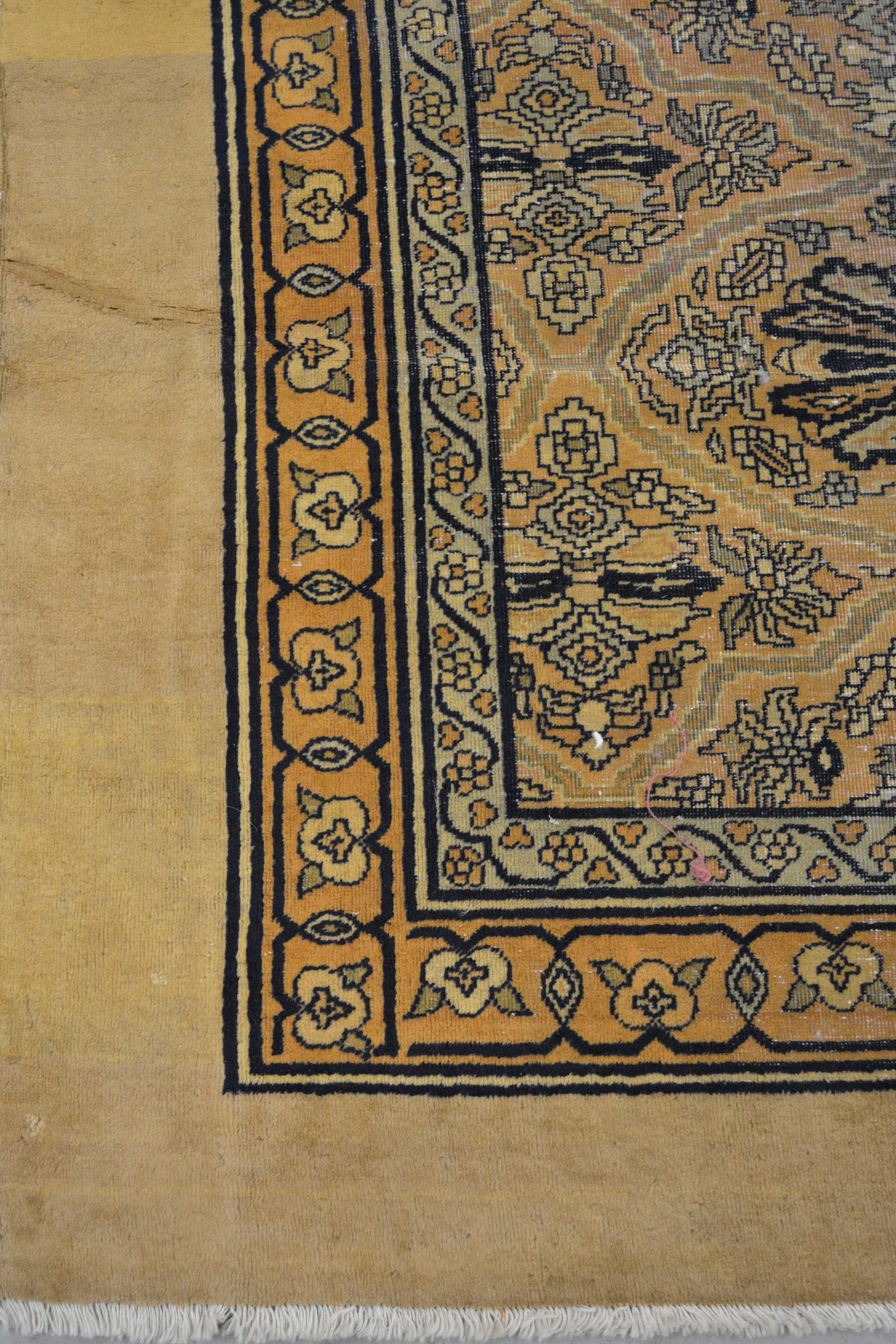 The outside thick border has a beautiful solid gold color followed by two thin frames which contain symmetrical patterns.