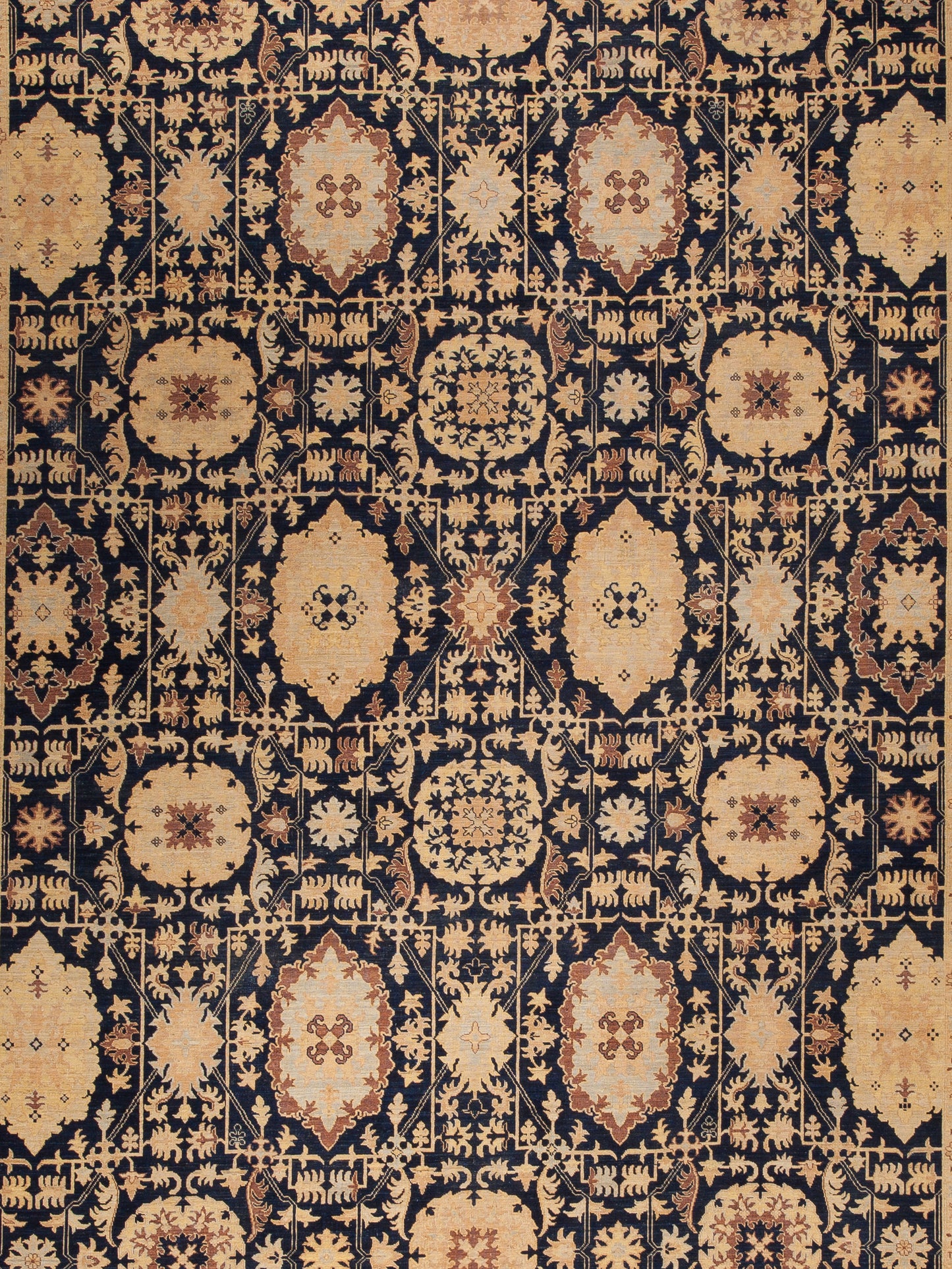 Finally, abstract leaves, swords, pine trees and more flaming shapes are featured in the center of the rug in a crowded pattern and all arranged symmetrically.