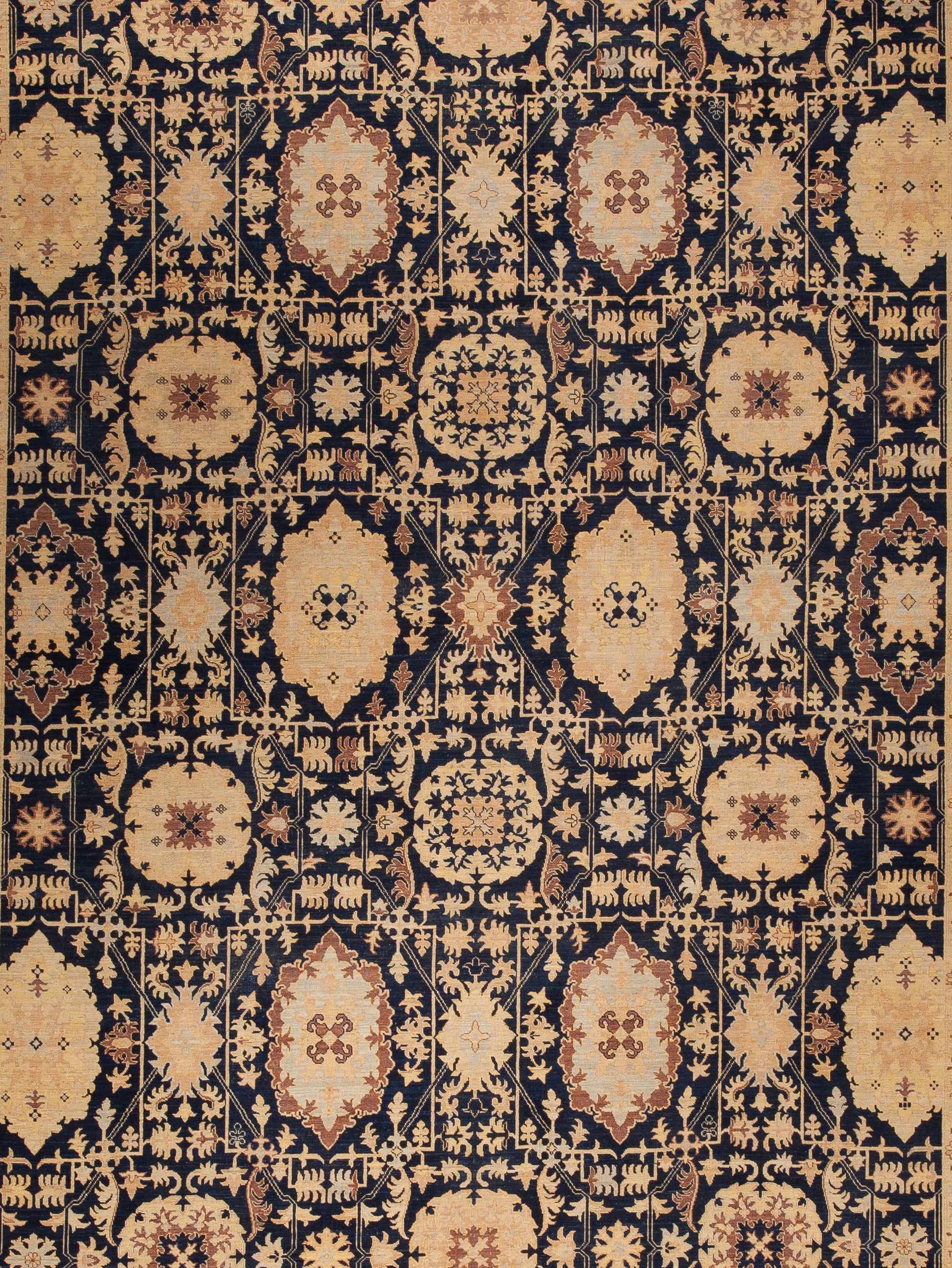 Finally, abstract leaves, swords, pine trees and more flaming shapes are featured in the center of the rug in a crowded pattern and all arranged symmetrically.