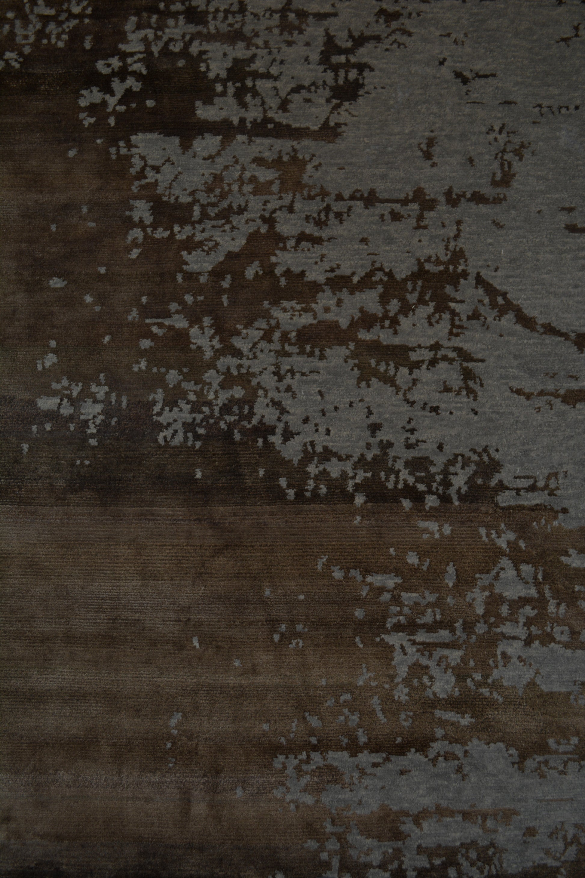 On the bottom left corner, the brown stylish spot design makes great contrast with the dark gray background.