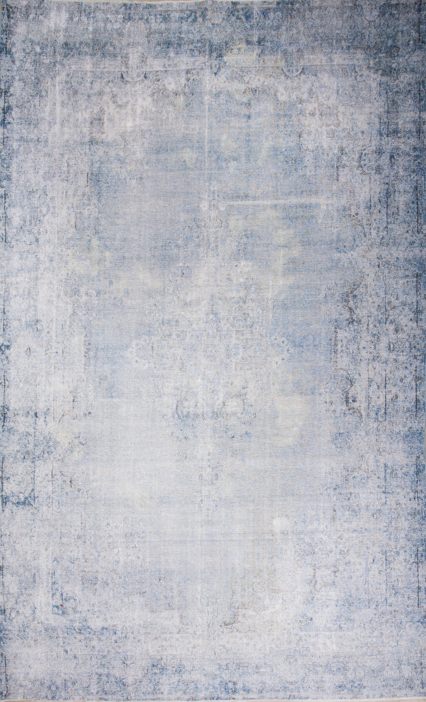 Vintage rug within white throughout navy blue in a distressed finish.