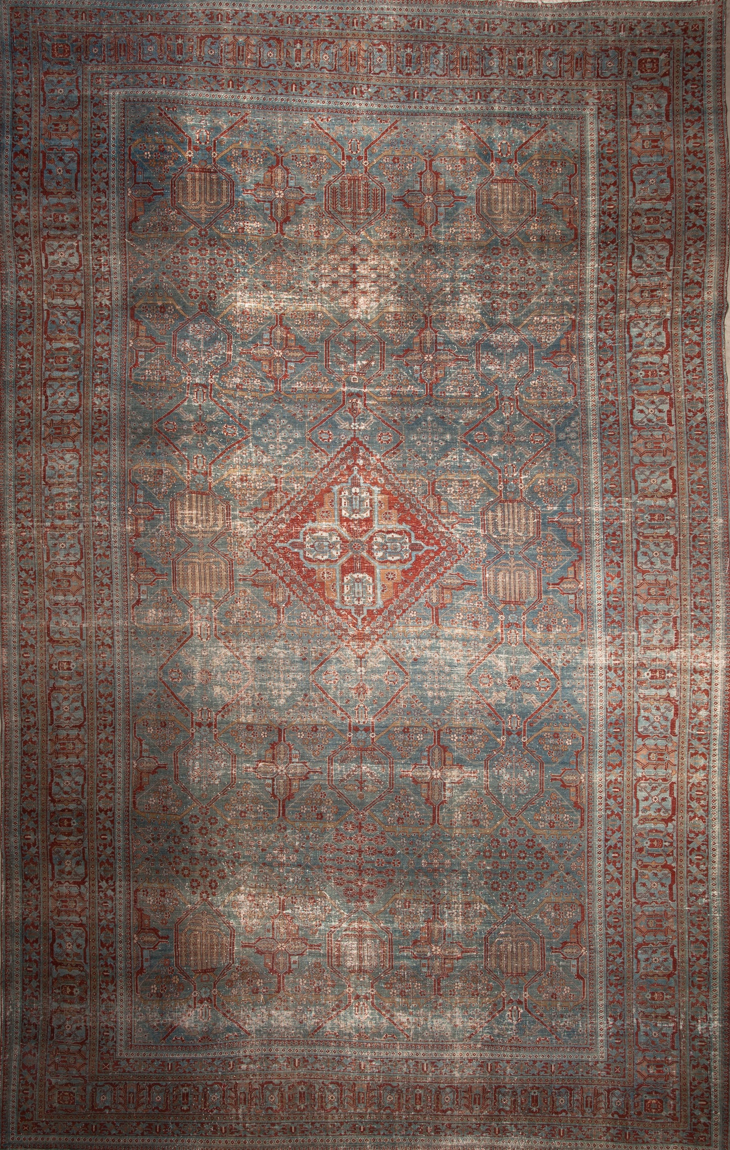 This antique rug is mystical, it holds wellness within its pattern.