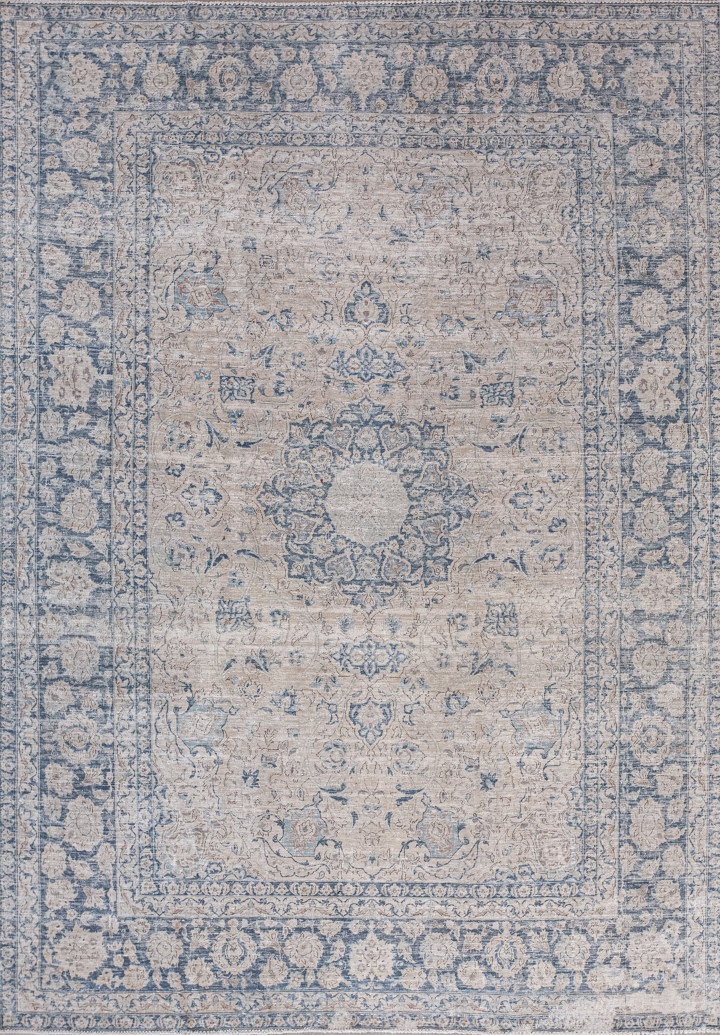 This pretty rug has a traditional composition. The two color scheme has a beige and blue background for the margin and pattern.
