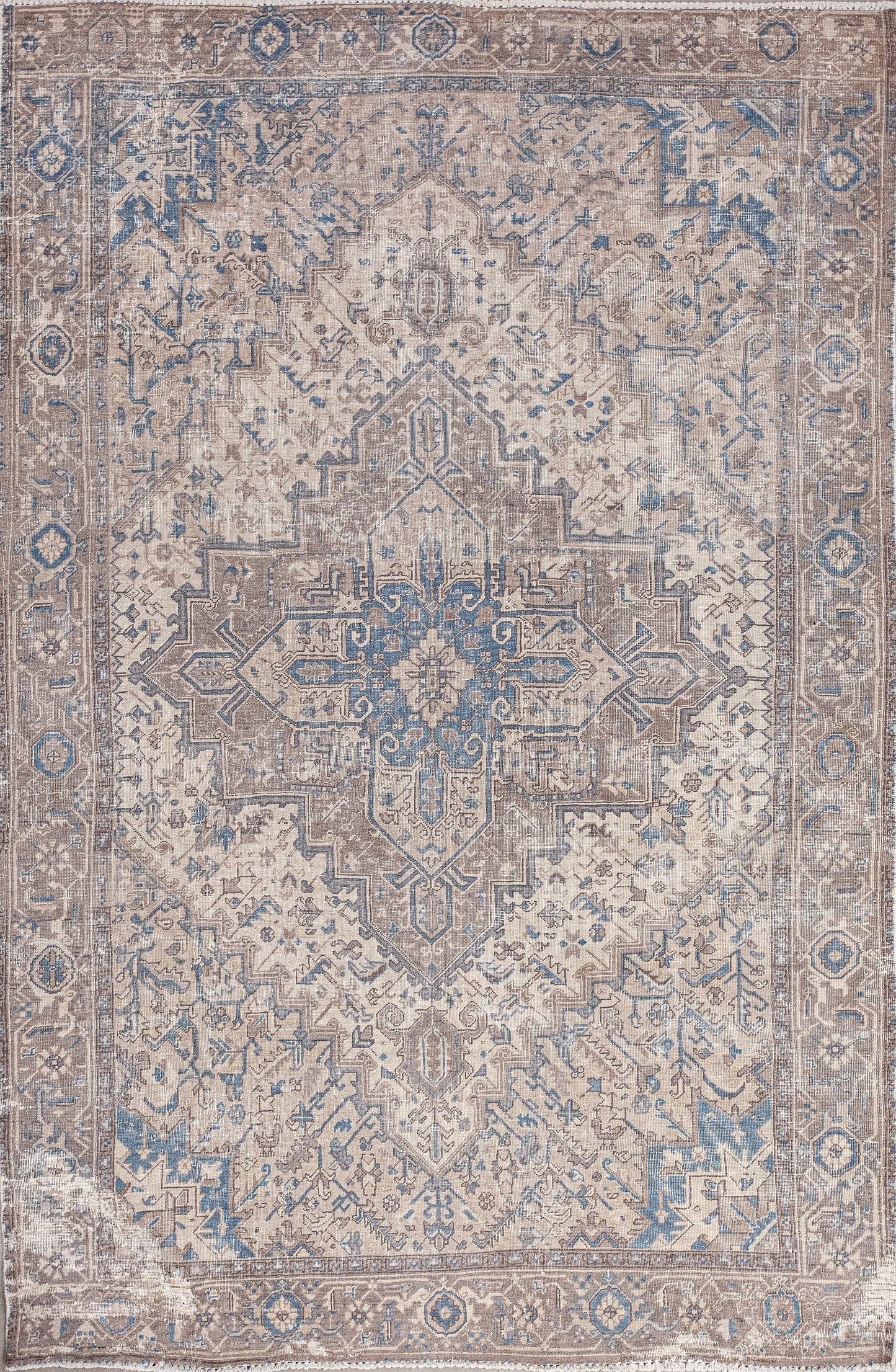 This distinguished carpet represents symmetry and perfection in its threads. The favorable color palette comes with beige, brown, and blue, all together they make a benevolent combination.