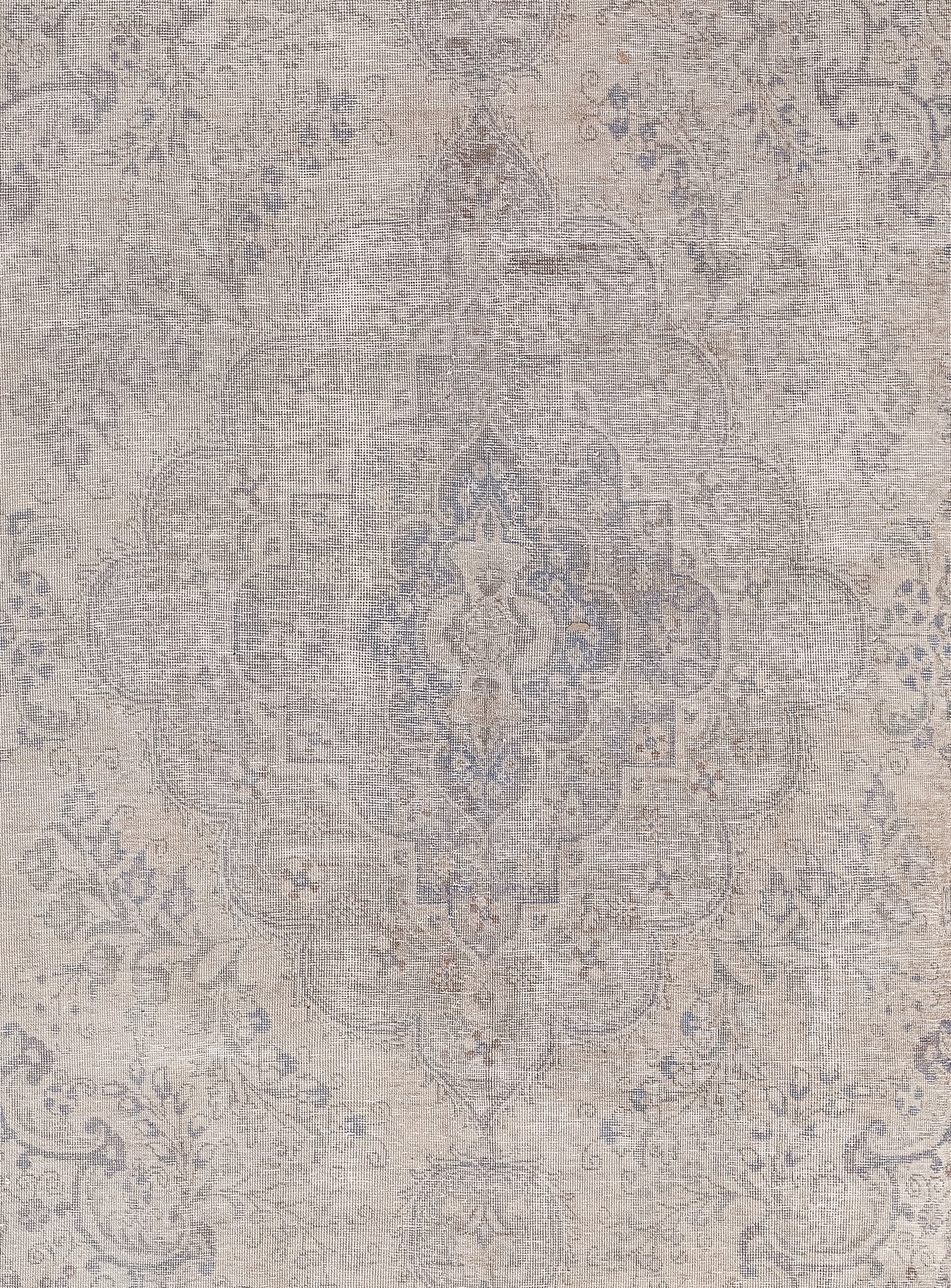 The centered artwork is a diamond outlined in semicircles that has others nested in muted tones.