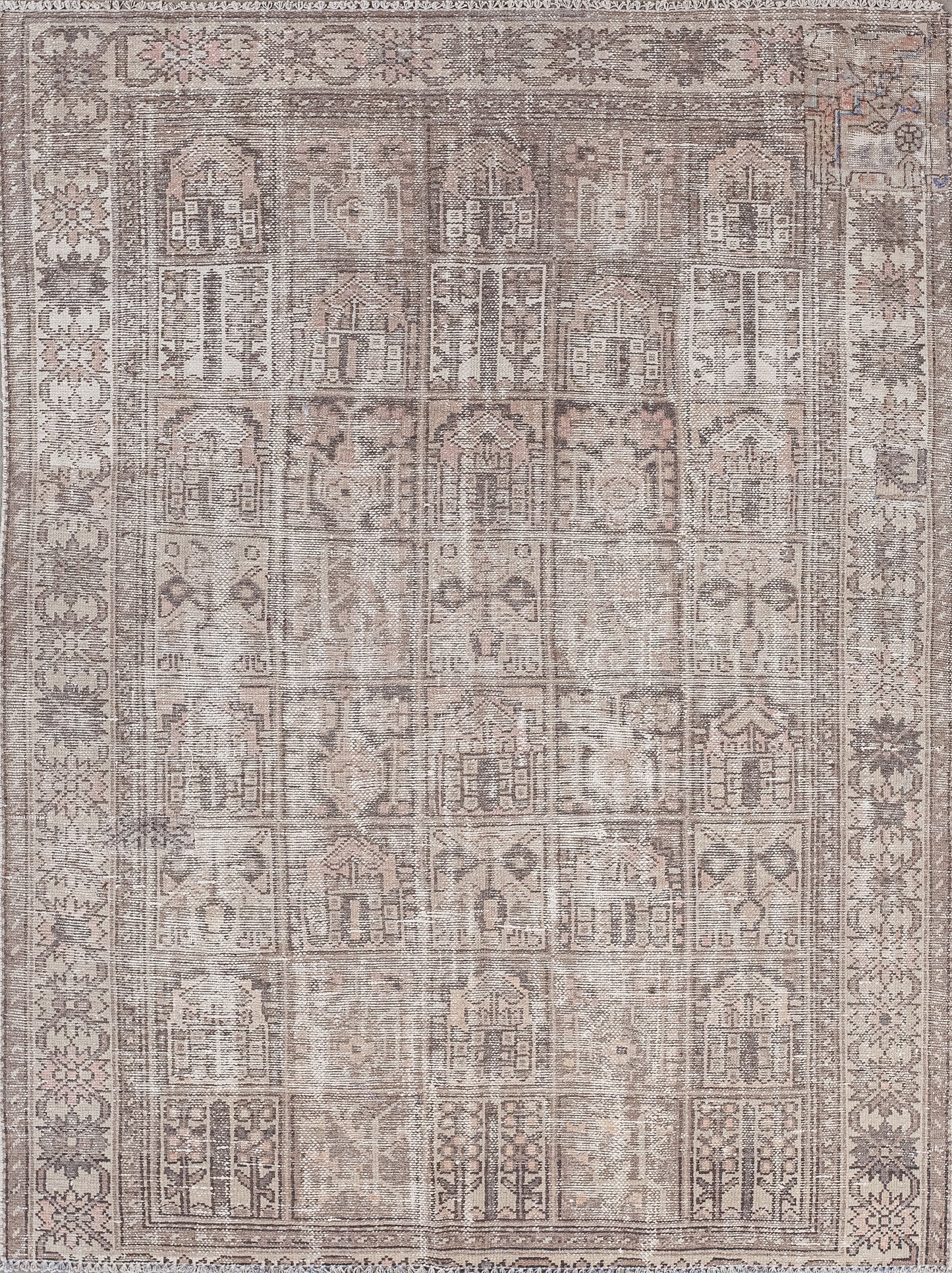 This informative carpet was woven to transmit beliefs, or customs from one generation to another. The simple color scheme has variations of brown only.