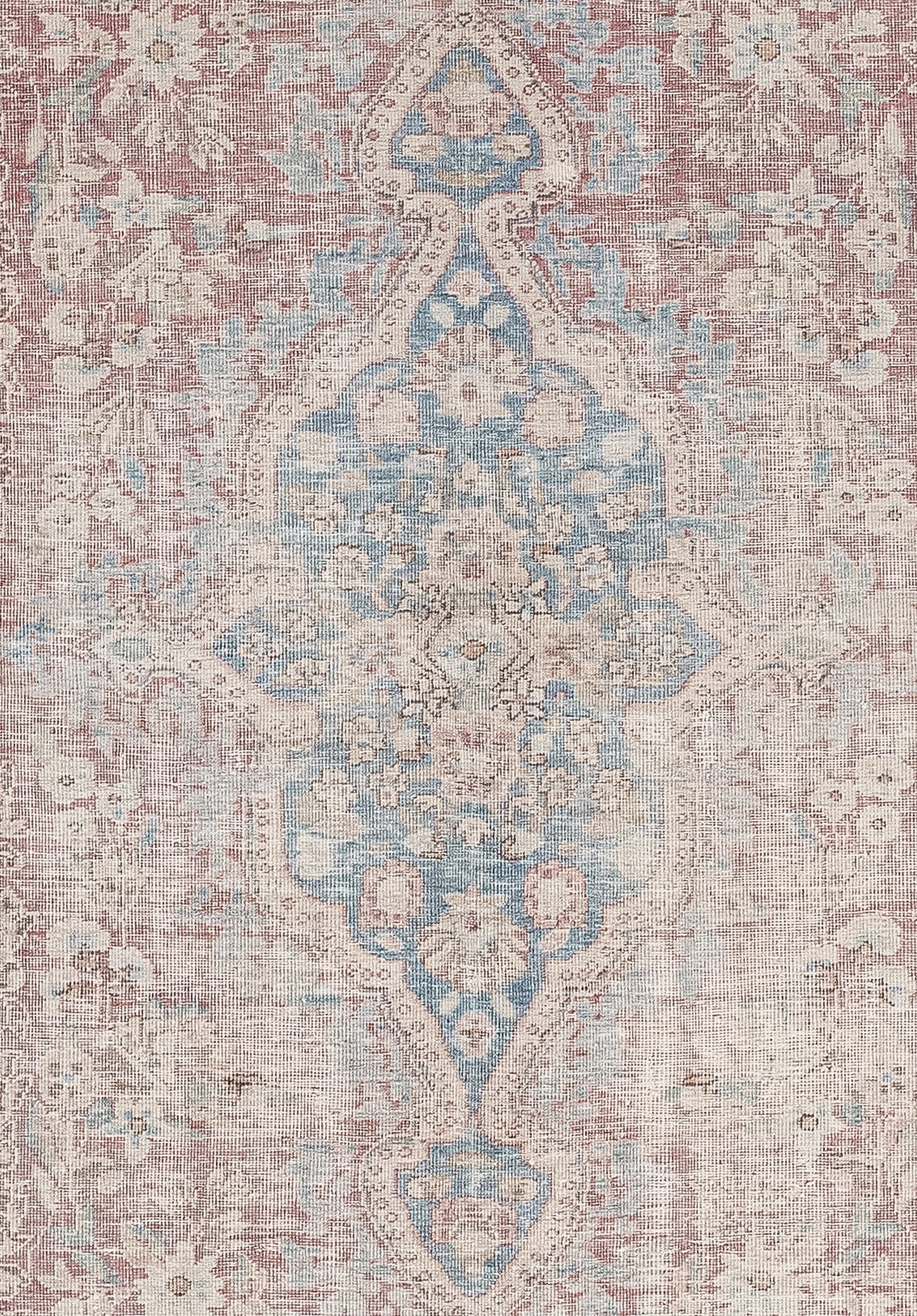 In the center of the rug a nice patterned blue ornament was woven with small details inside.
