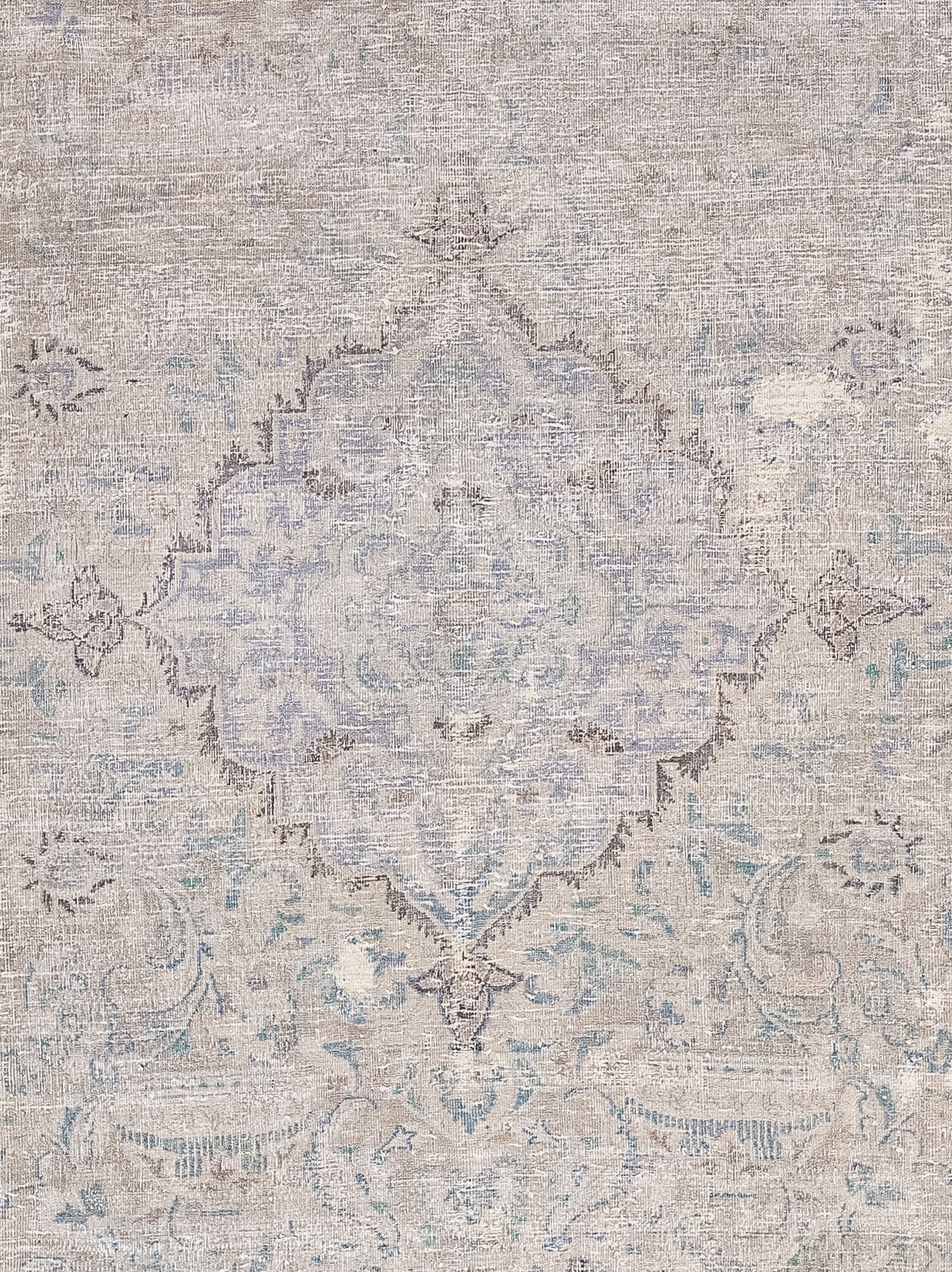 The foreground of the rug features a diamond-shaped ornament filled with symmetrical trims.