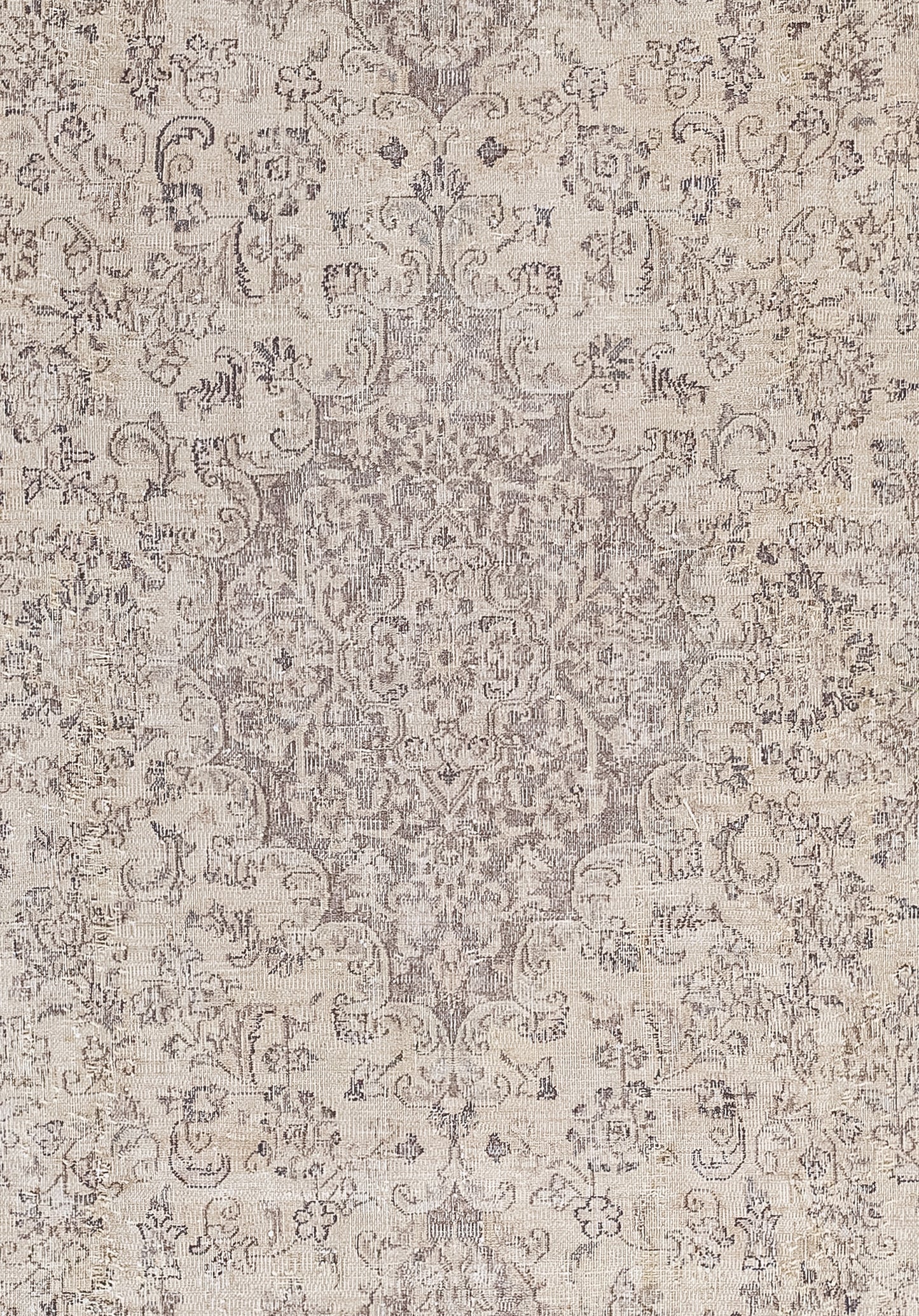 The center's close-up presents a rhombus-shaped fine ornament with nested outlined abstract shapes.