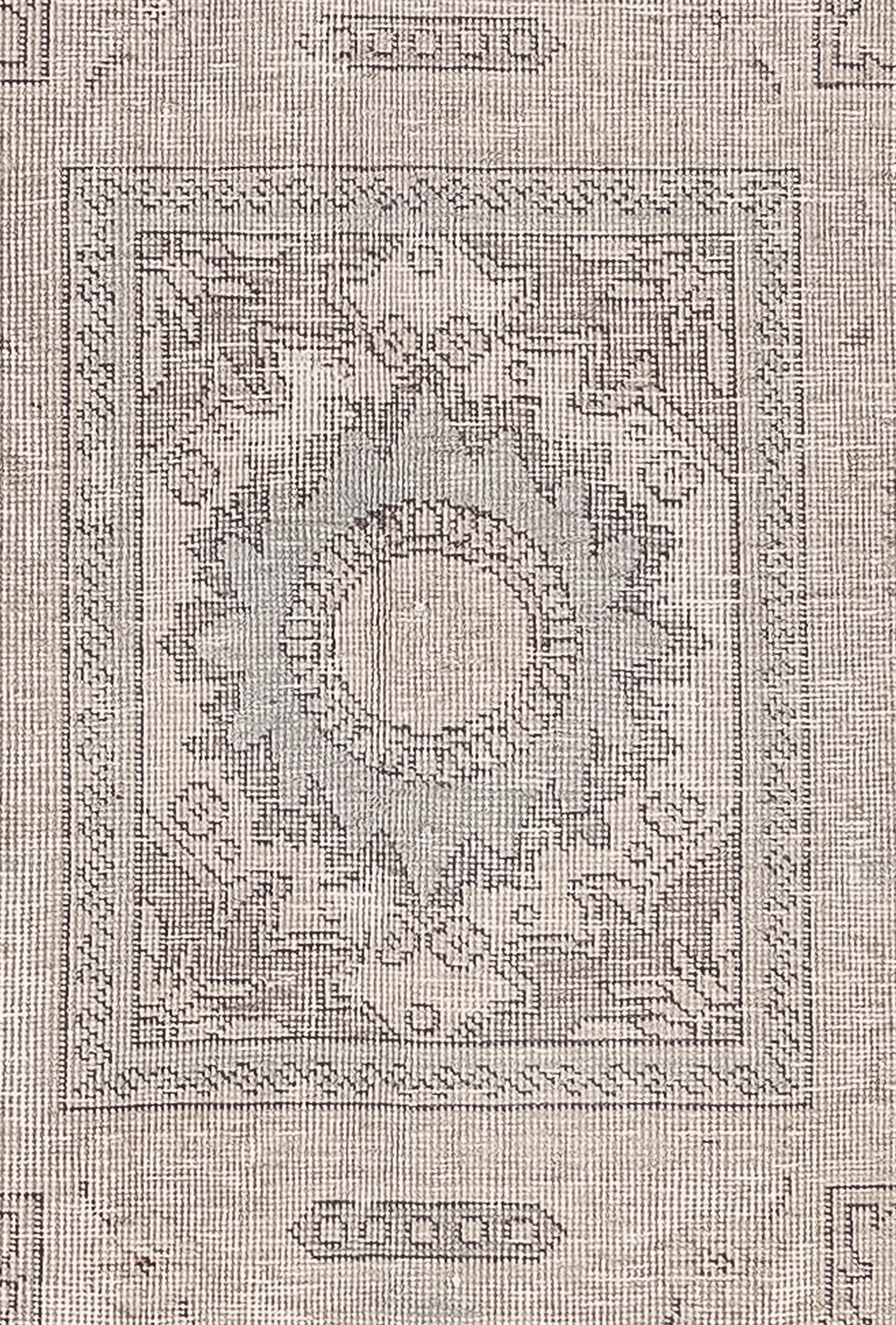 The close-up of the carpet shows a rectangle supporting a nested one and its center has mandalas with a circle as the focal area.