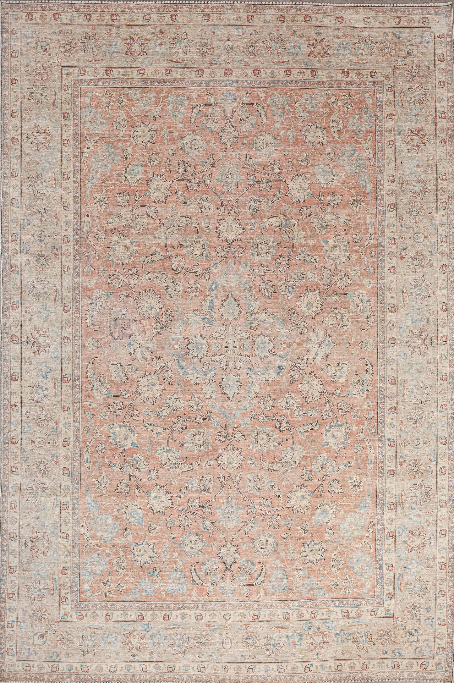 This captivating carpet is perfect for living room and dining room. The color palette comes in varieties of beige for the perimeter, blue for the highlights, and mostly a light-tangerine shade that is believed to aid digestion.