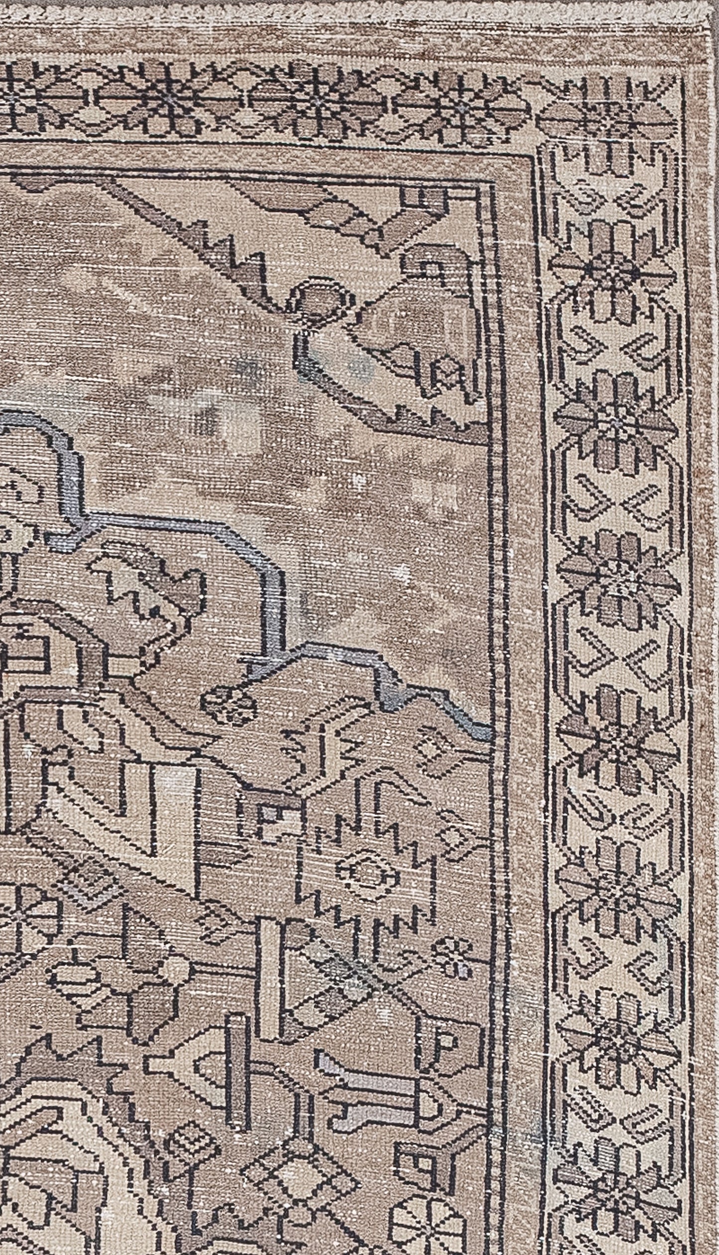 there is a thin border filled with small sloping rectangles.