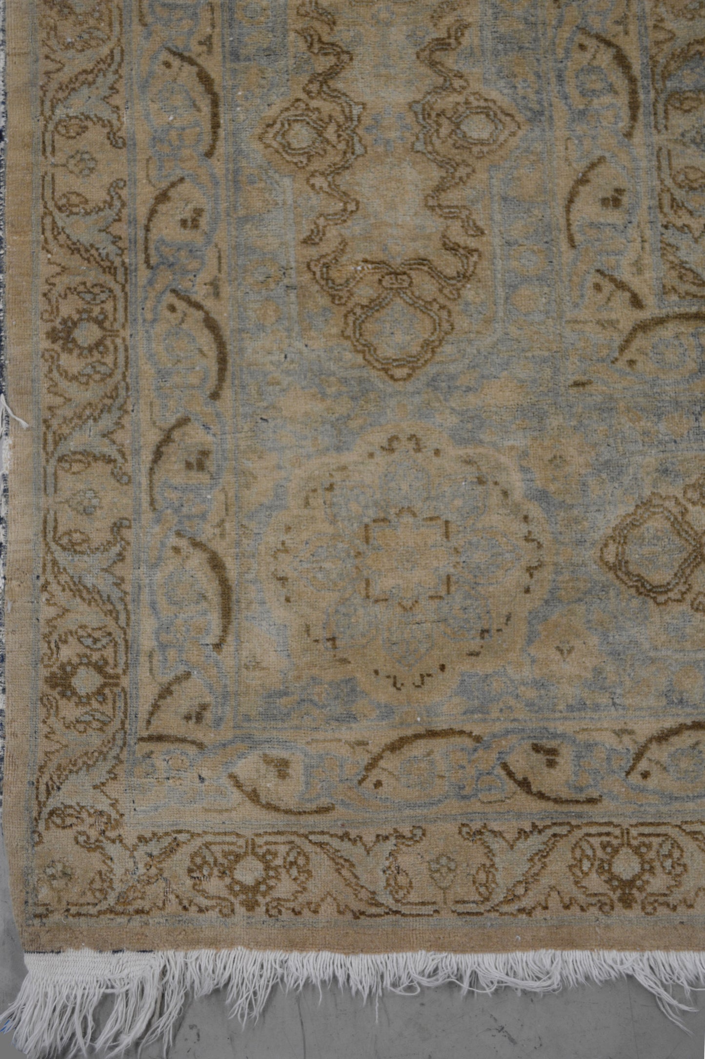 On the bottom left corner the distressed thin frame renders brown outlined ornaments.