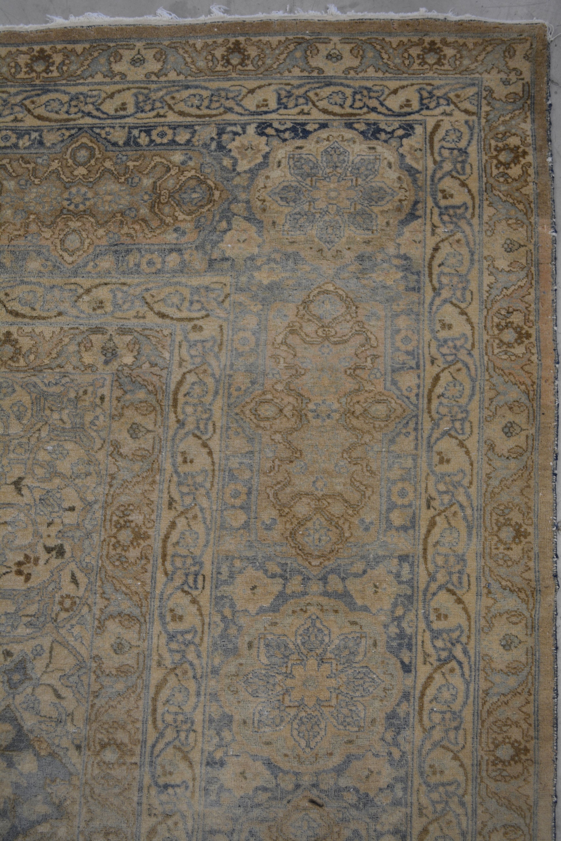 On the top right corner the thicker frame has a random fade out blue background with flowers and ornaments on top.