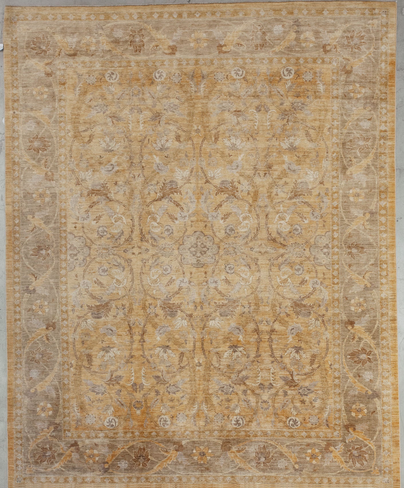 This unique rug has been woven with a spring vibe and a practical distressed finish. The color scheme evokes happiness because it has yellow for the background and variations of gray for the thick frame and the pattern.