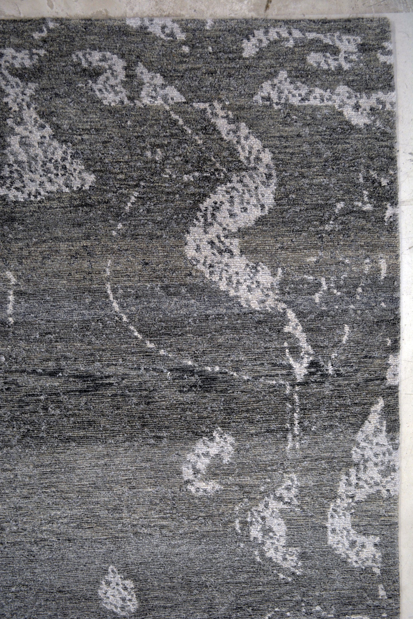 On the top right corner, there is the part that holds the pendalogue.