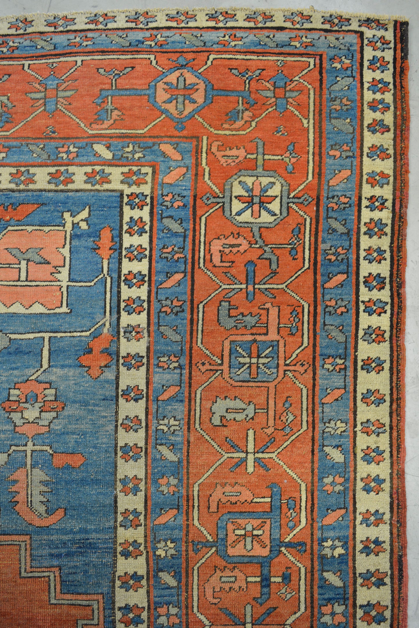 On the bottom left corner, there are two thin borders with a ninja start pattern.