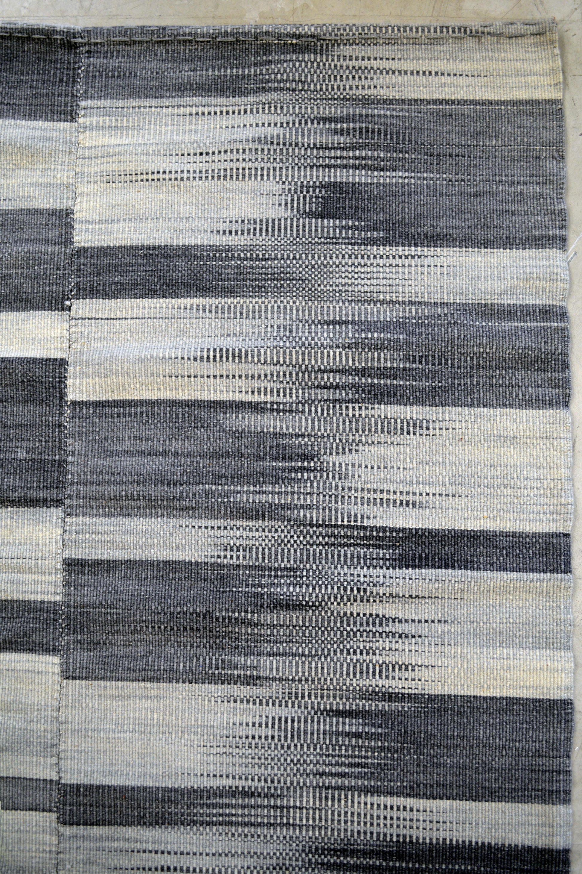 This carpet would lie down amazingly over the floor of your entertainment room.