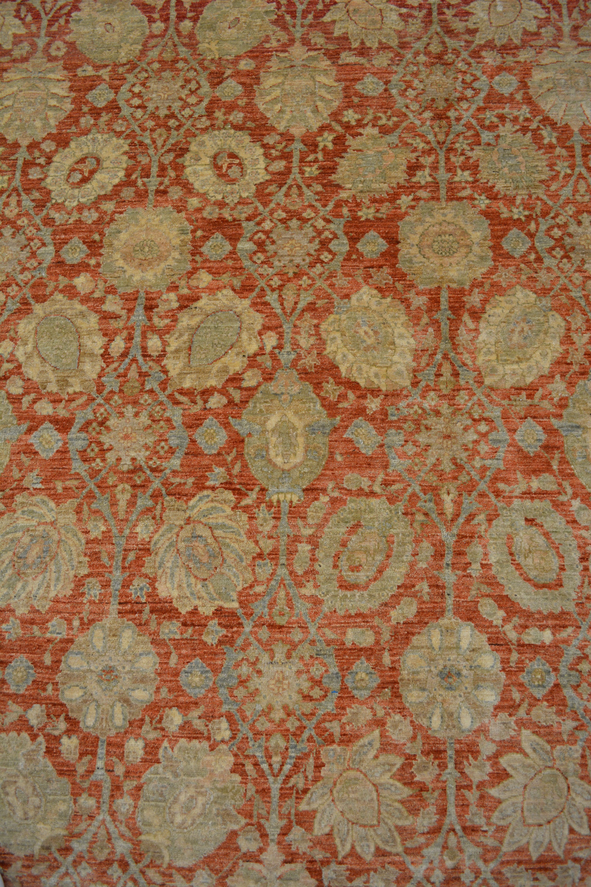 The pattern renders flowers, leaves, and ornaments arranged symmetrically.