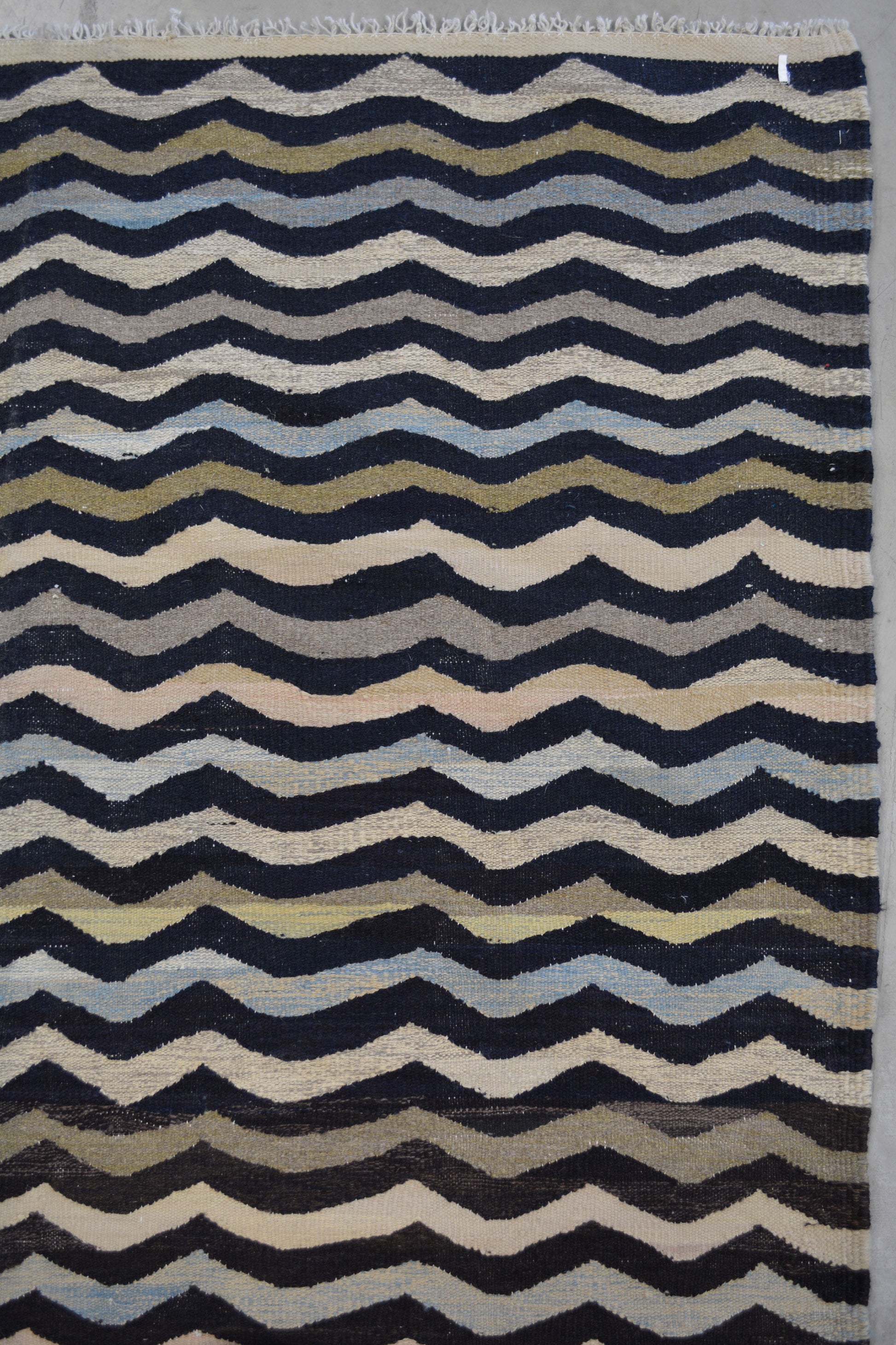 the color scheme displays white, blue, pink, green, gray, and mostly black.