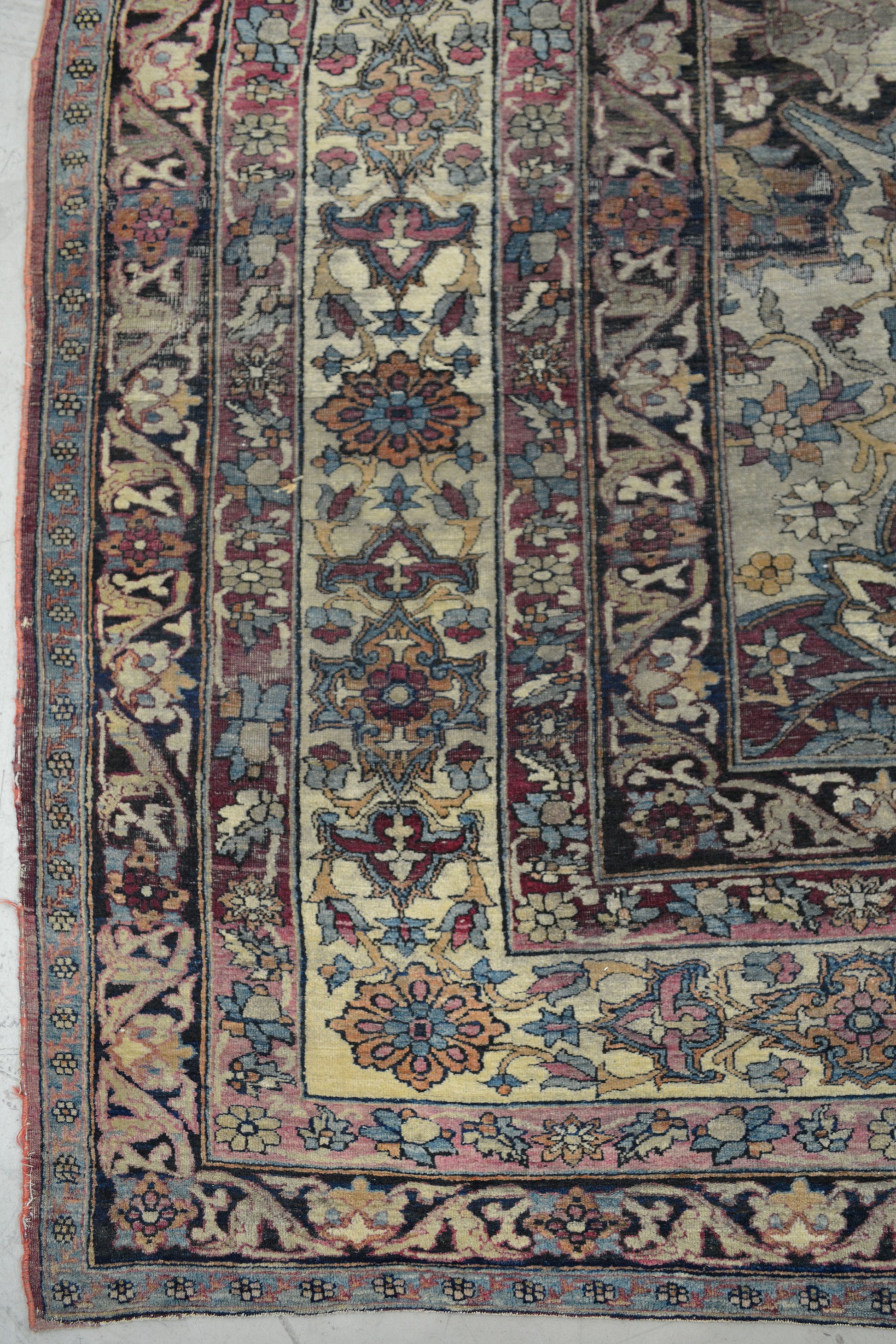 On the bottom left corner there are several thin borders with abstract flowers in different colors.