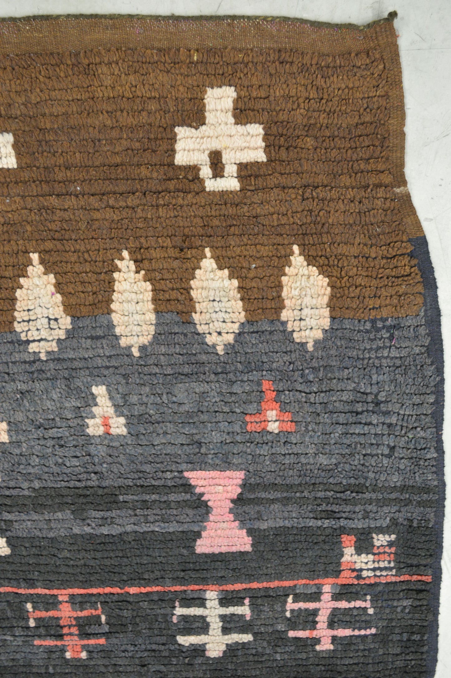 On the top right corner, there is a leaf and a triangle pattern.