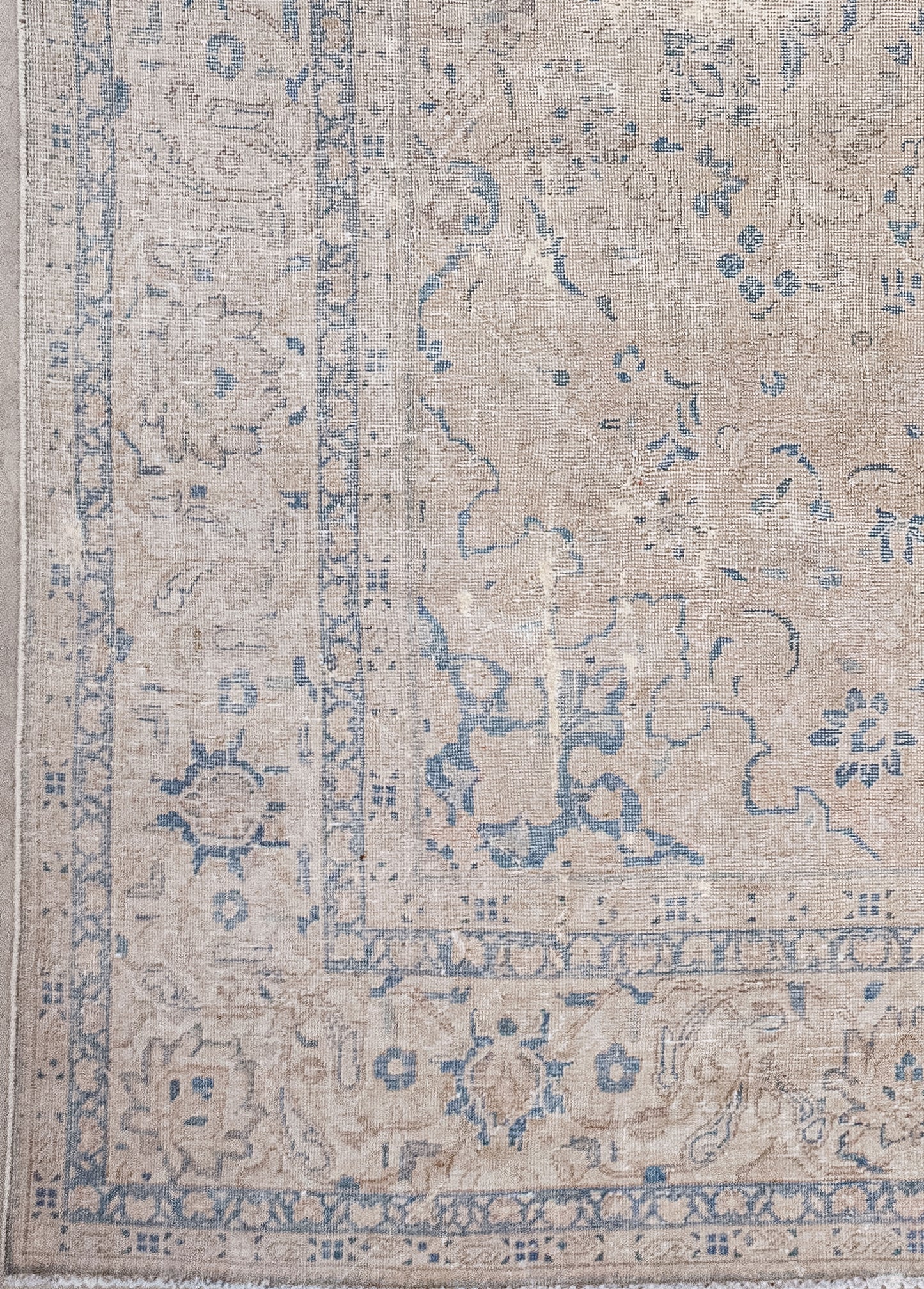 From the lower corner towards the entire margin, there are two thin borders with squares and butterflies patterns.