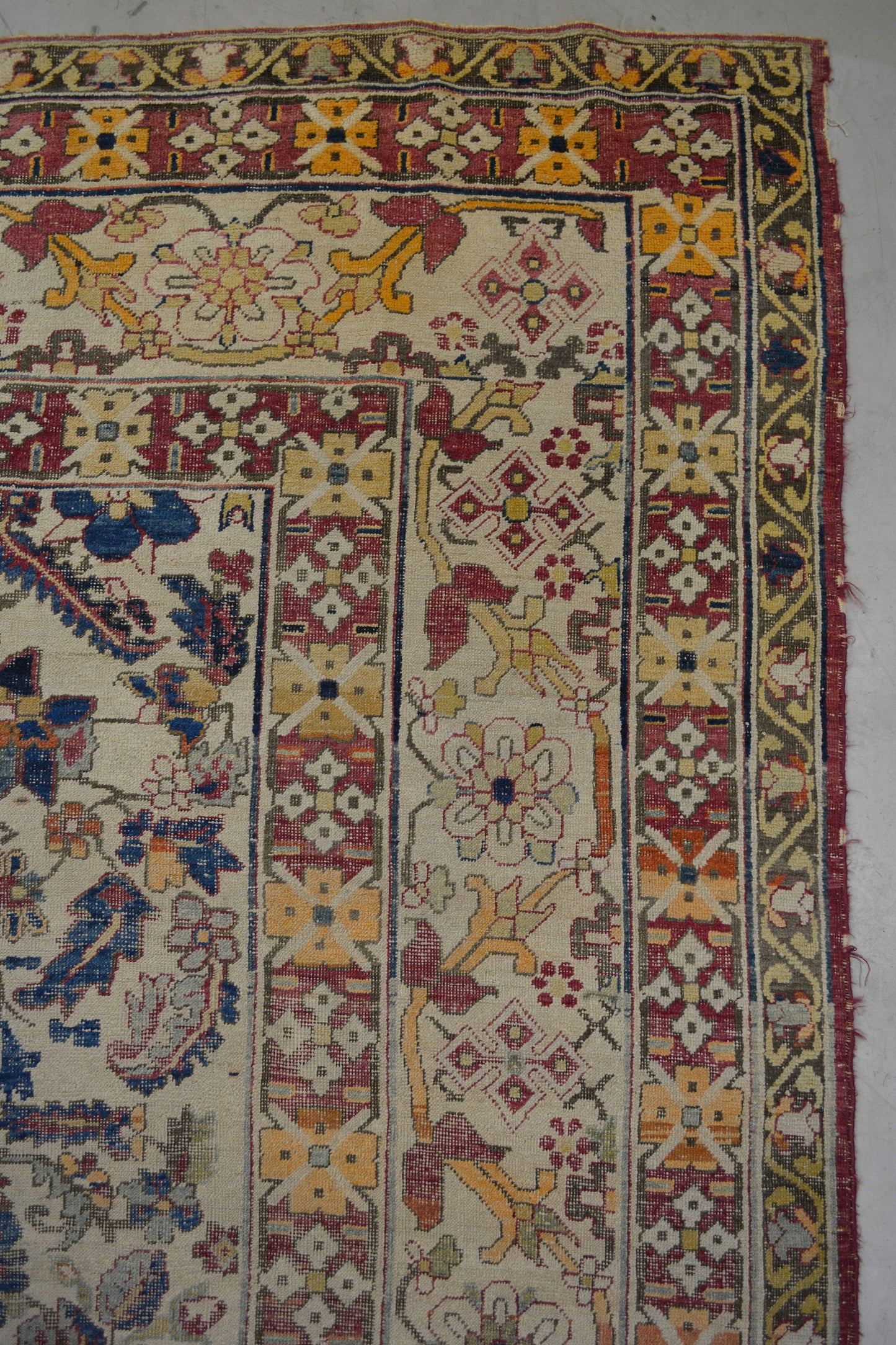 On the top right corner, there is a thicker frame with white background, rhombuses, alcatraz, and climbing plants.