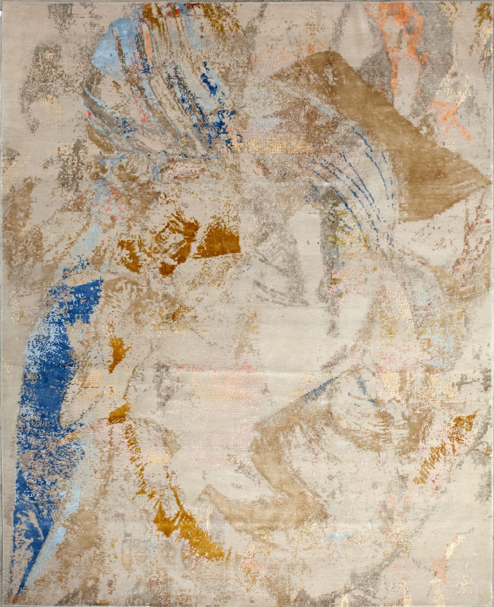 A new-fashioned rug comes knitted with the Modern style. The color scheme is beige for the background and random brush strokes in brown, caramel, and gray.