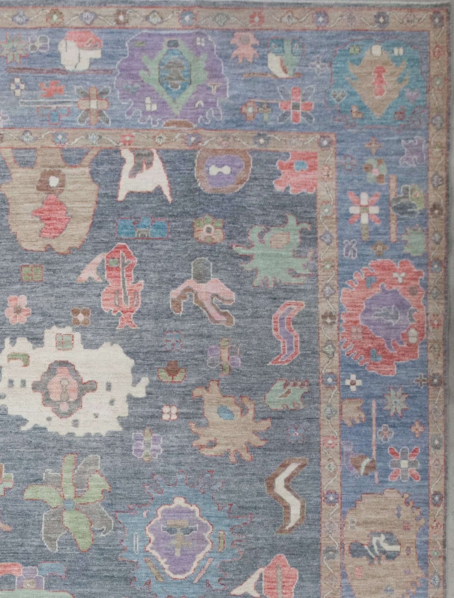 The beige borders display small flowers with thin white branches unifying them, while the blue frame shows fishes, and corals.