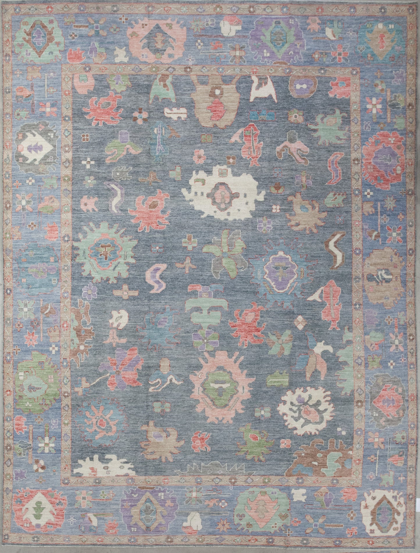 Excellent rug comes with an enjoyable color scheme which has green, blue, beige, and details in orange, white, pink, purple, and brown. The design renders abstract octopuses, marine flora, corals, fishes, and stingrays.