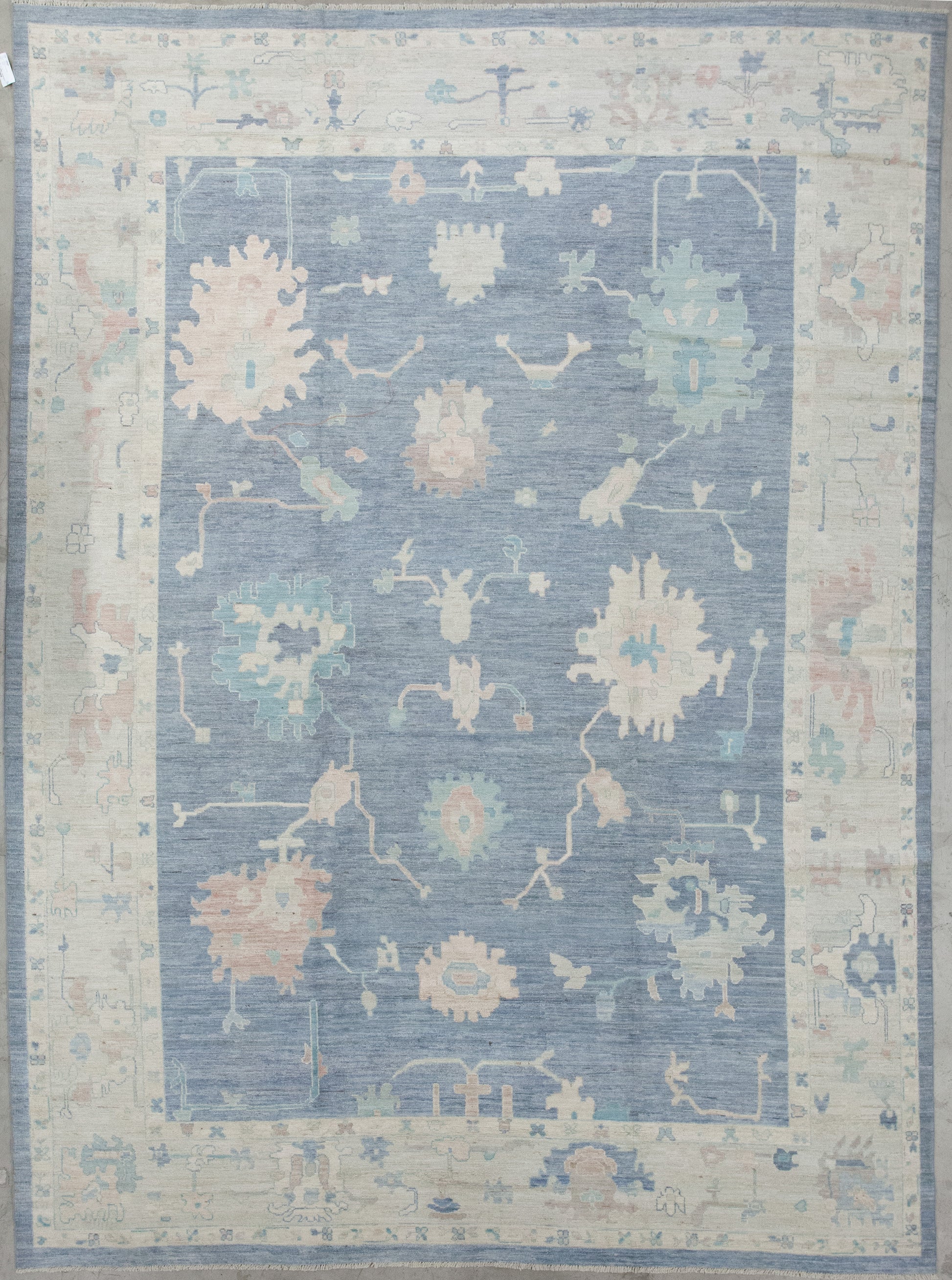 First-class rug has the beach vibe within its knots. The color scheme comes with blue, pearl, pinkish, and brown. In addition, the design renders big corals with small corals inside and a few linear thin branches around them.