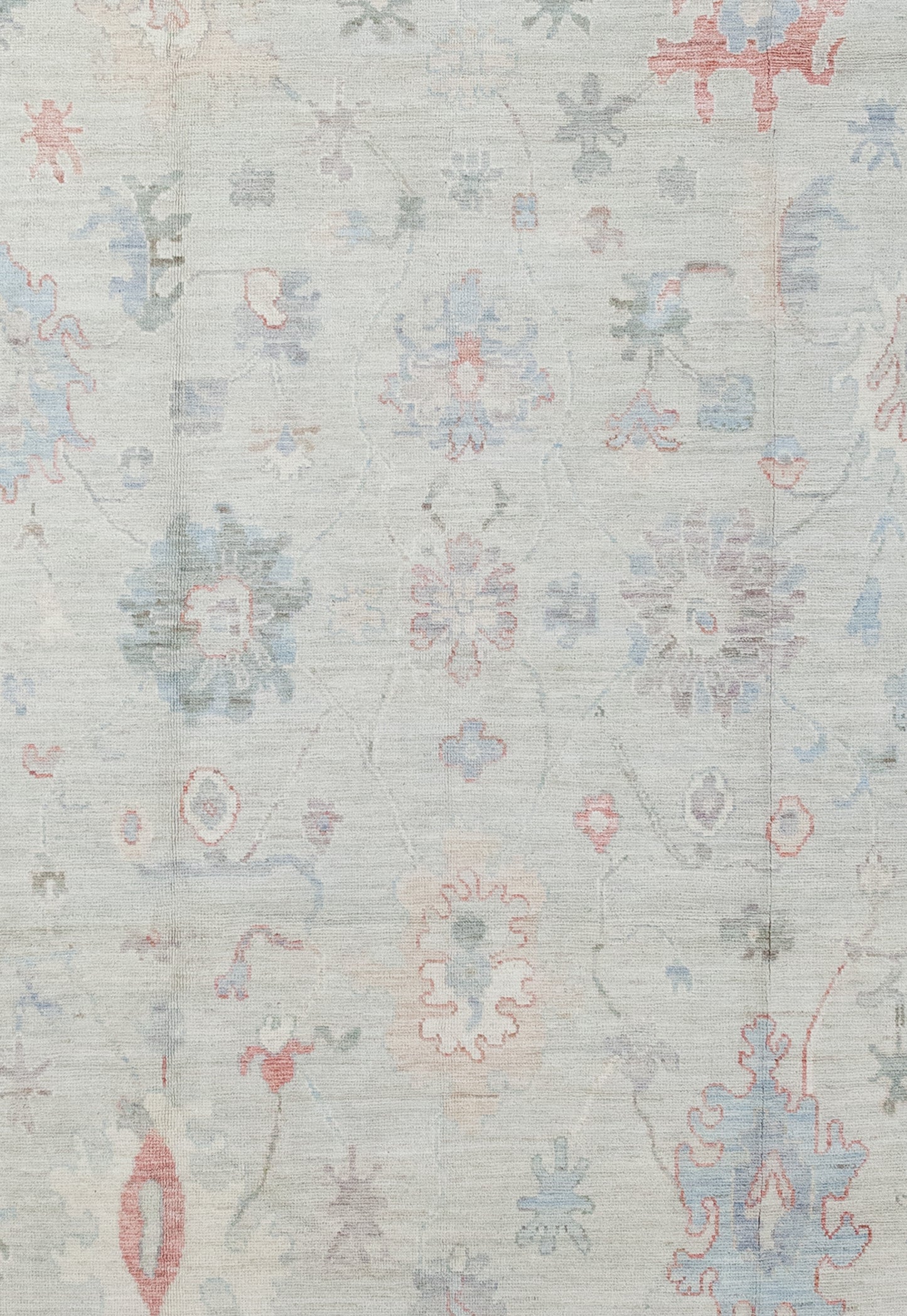 The rug's center has sunflowers arranged symmetrically.