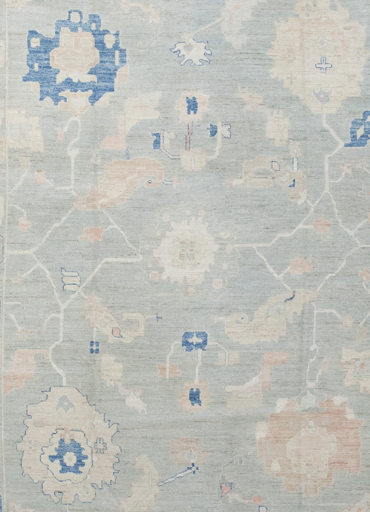 The center of the carpet features large colorful coral heads.