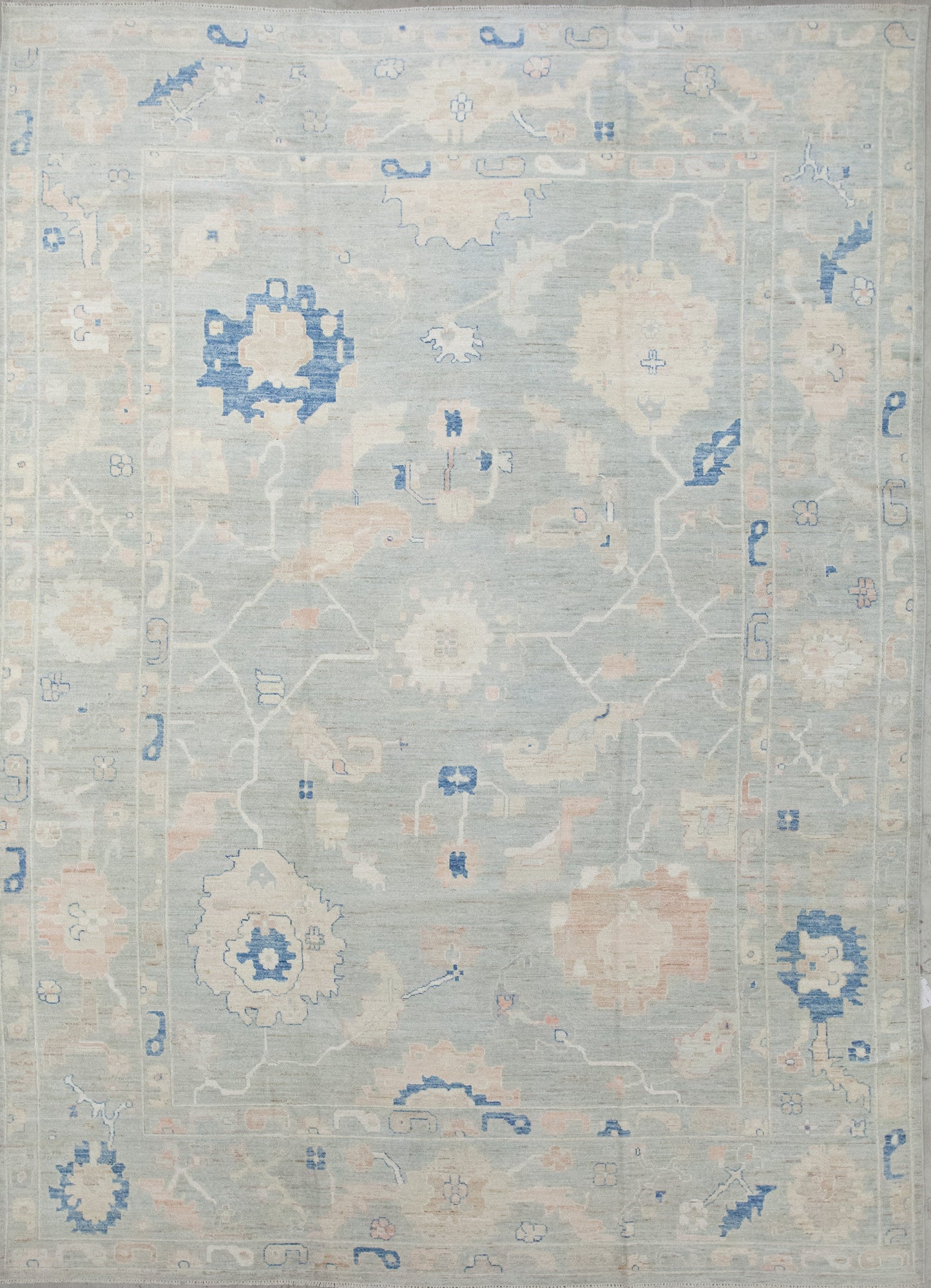 This classic rug was knitted with gray background and a chaotic corals' abstraction as a pattern.