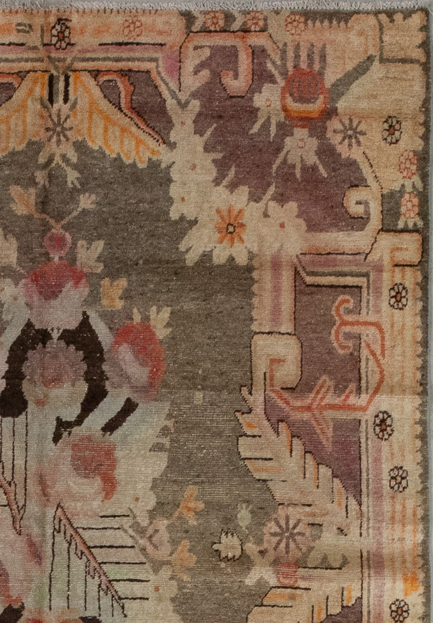 The focal design features a non-representational camellia bouquet flowers on top with its reflection on the bottom making them a whole large composition for the center.