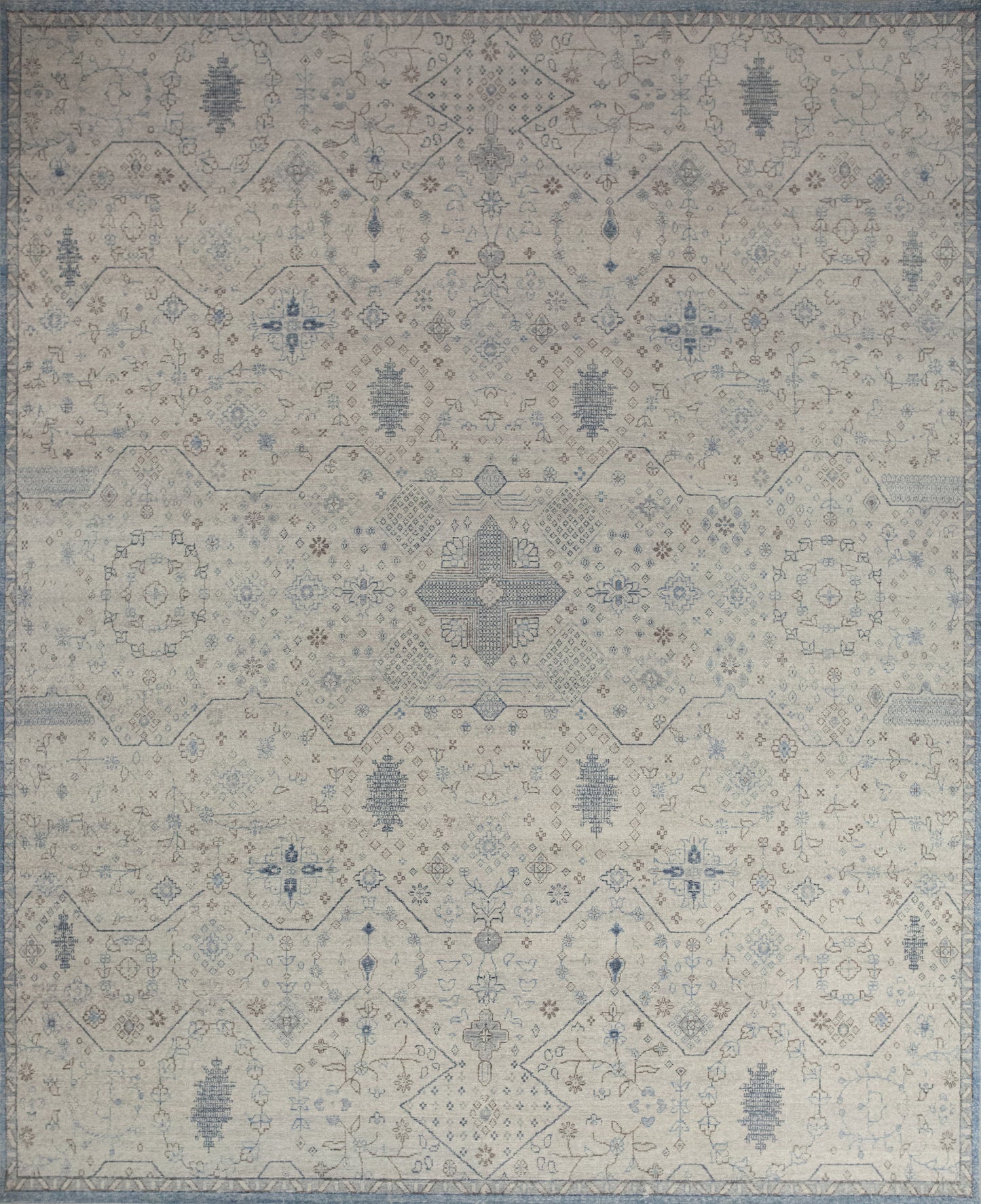 Flawless carpet comes with a relaxing color theme which has light blue, beige background, and brown details.