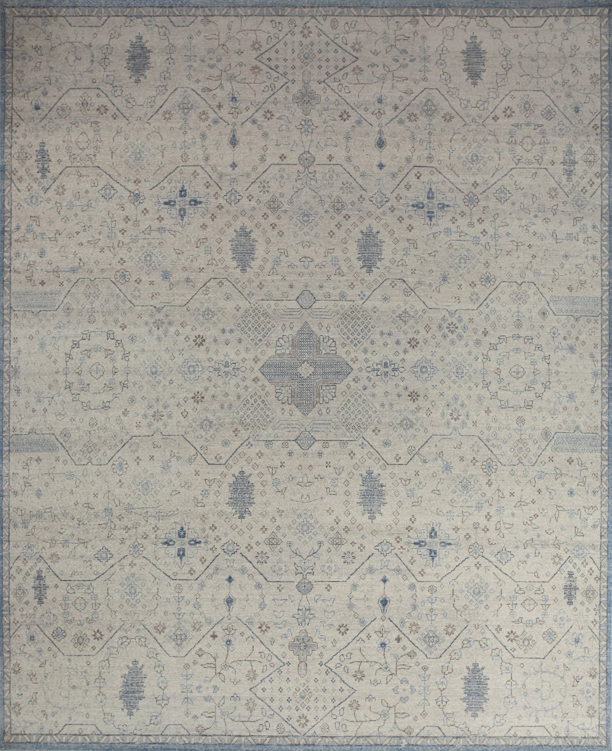 Flawless carpet comes with a relaxing color theme which has light blue, beige background, and brown details.