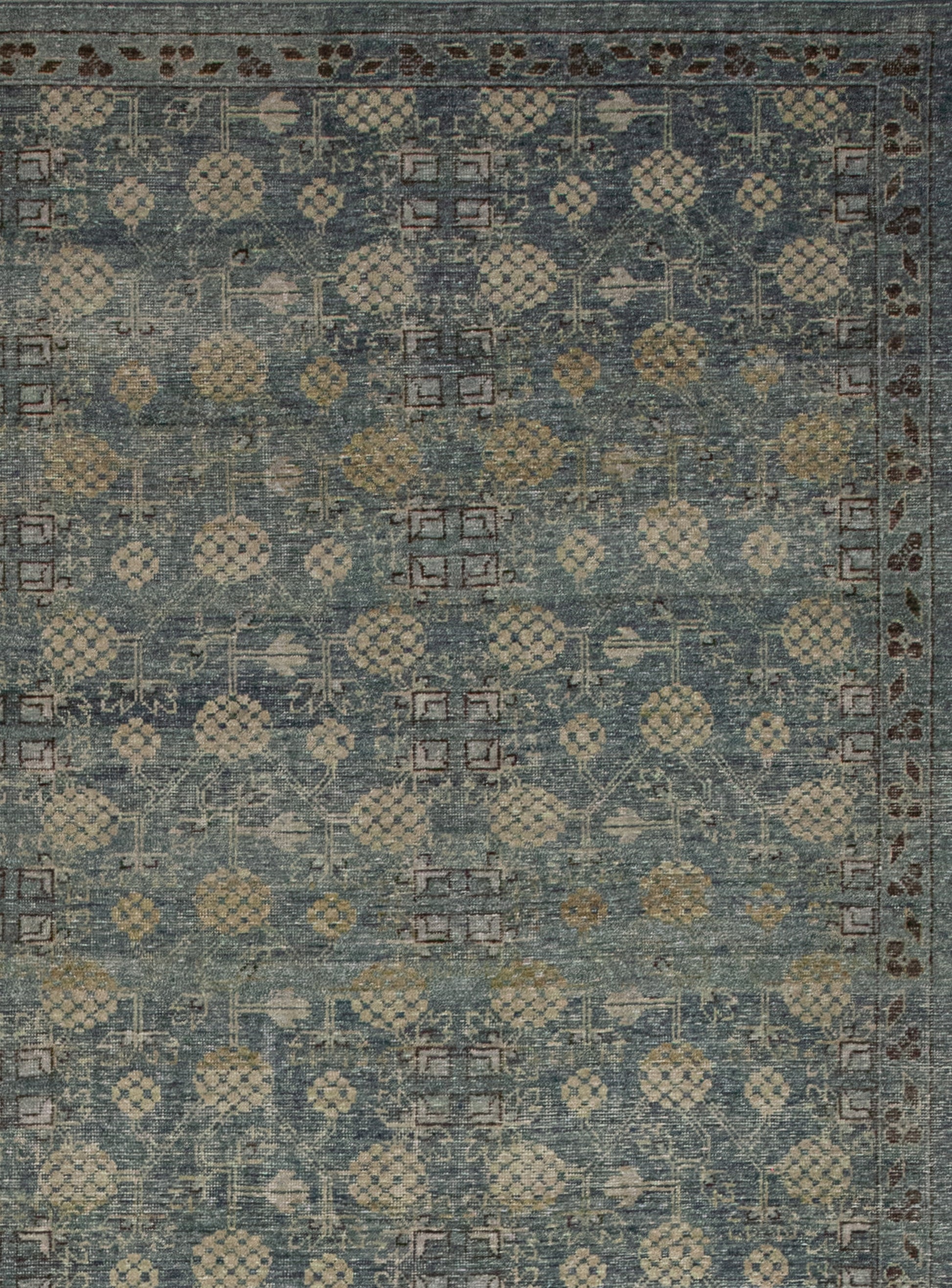 The symmetrical pattern renders honeycombs over the whole rug.