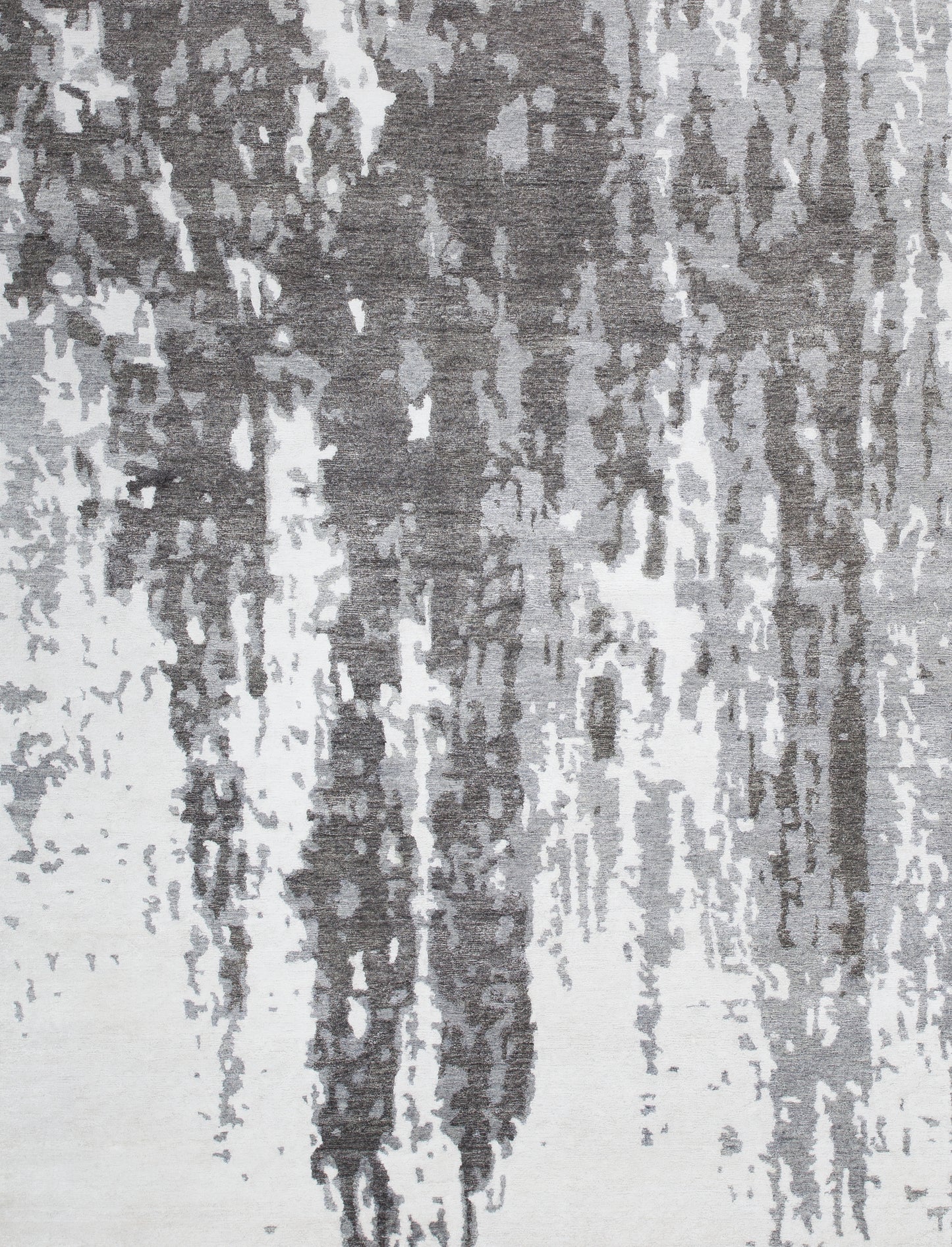 Modern carpet comes with a rough stylish pattern. The bottom left corner shows the abstract design chaotically.