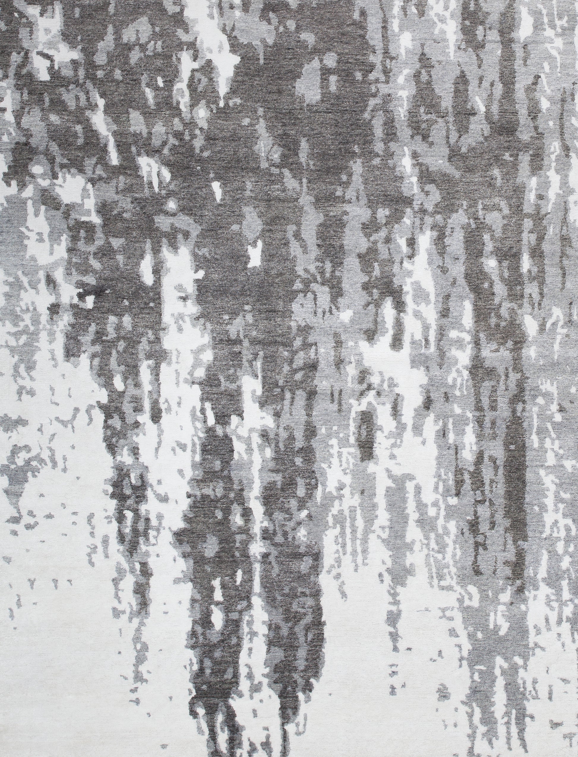 Modern carpet comes with a rough stylish pattern. The bottom left corner shows the abstract design chaotically.