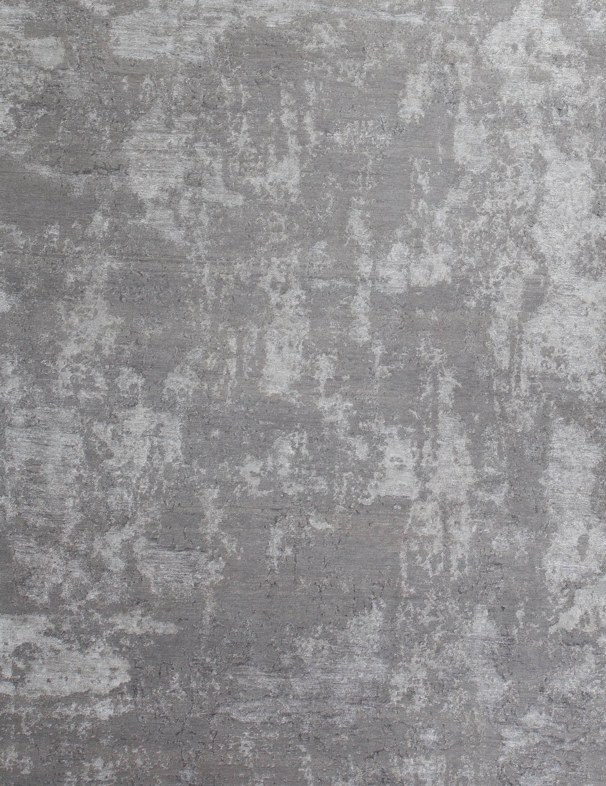 On the bottom left corner, the design of the rug is consistent.
