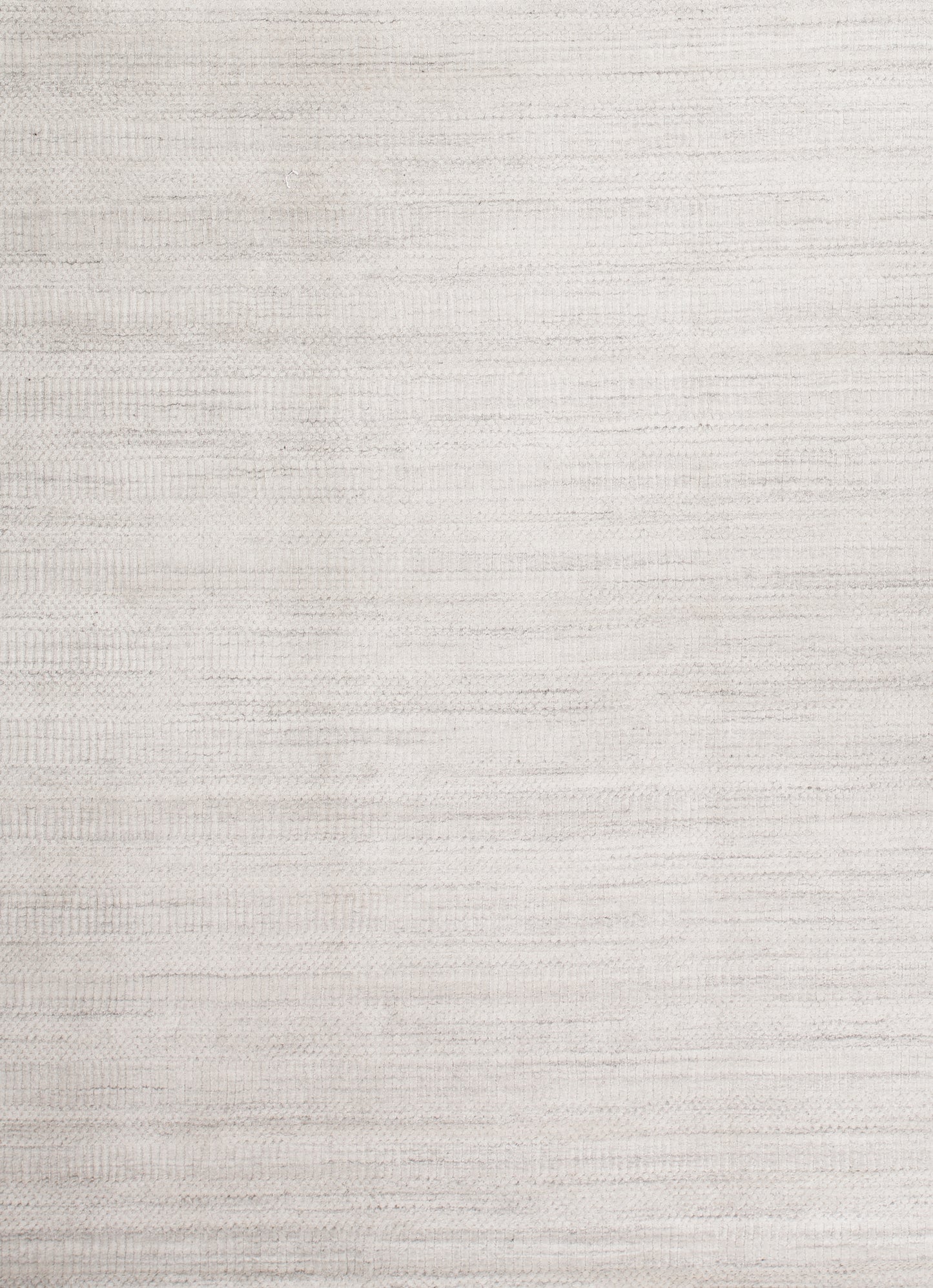 On the top right corner, the plain white texture and the consistency of the knitted pattern are shown.