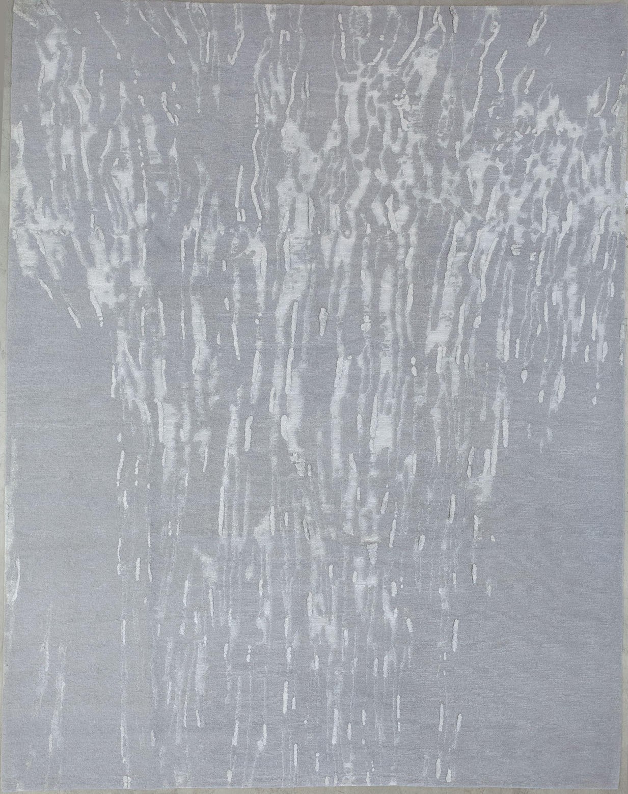 Twenty-first-century rug comes with the modern style, also its knots are in a duo-tone scheme which is white and gray.