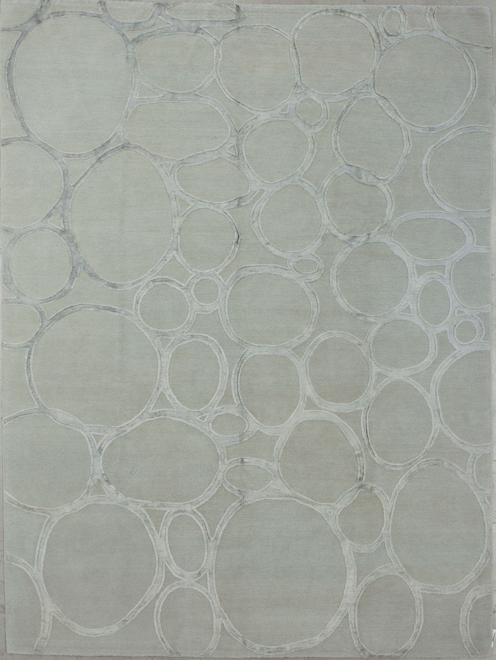 Contemporary rug comes with a bubble design.