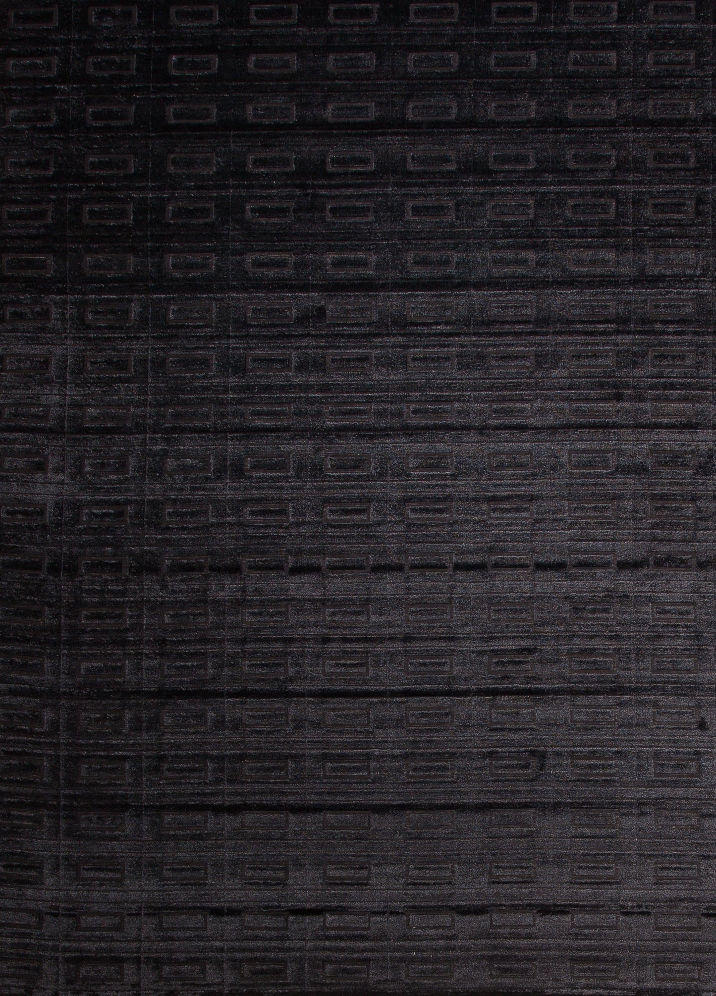 The pattern spreads all the way to the borders of the rug. The center of the rug renders a closer look to the texture.