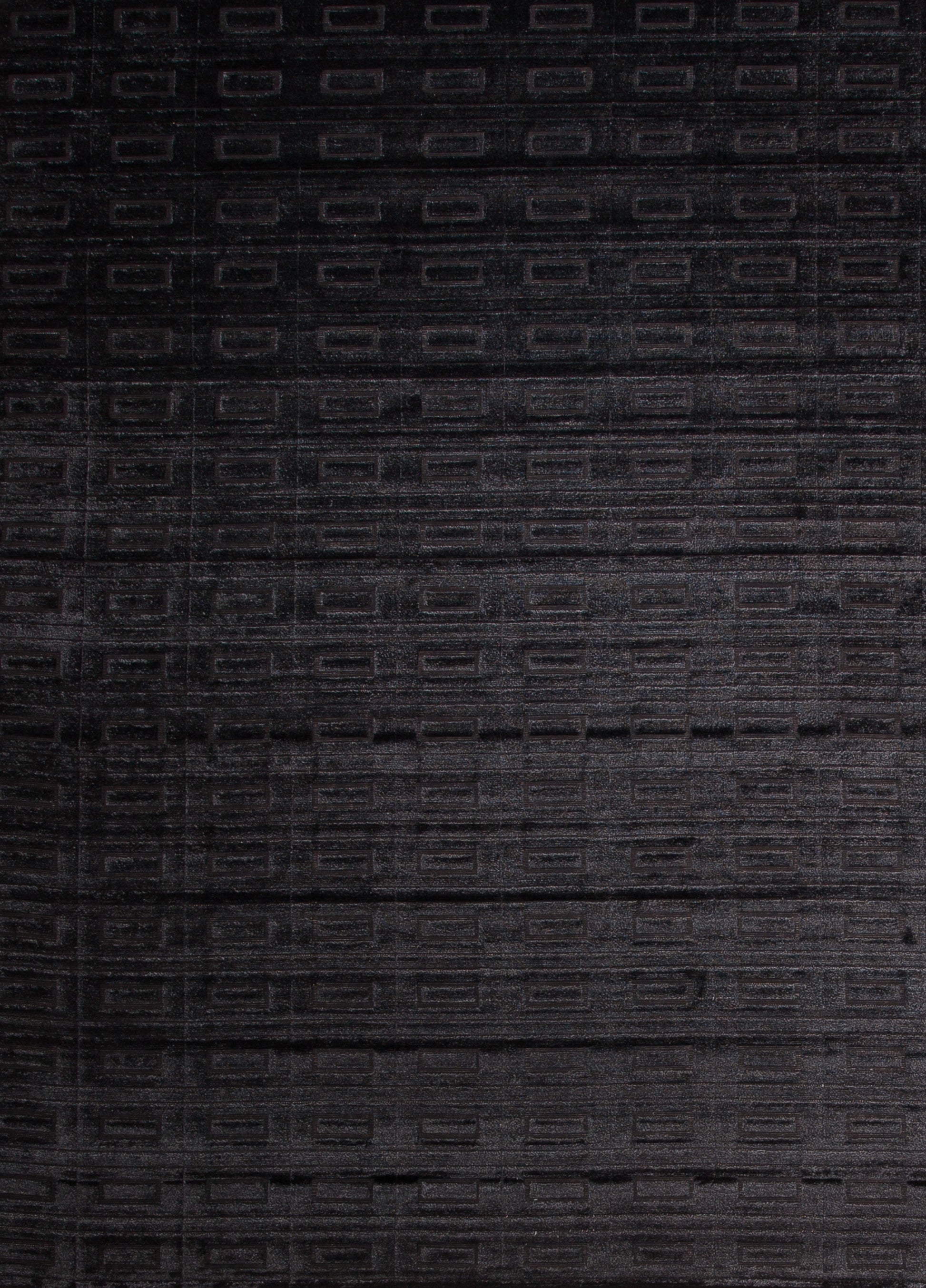The pattern spreads all the way to the borders of the rug. The center of the rug renders a closer look to the texture.